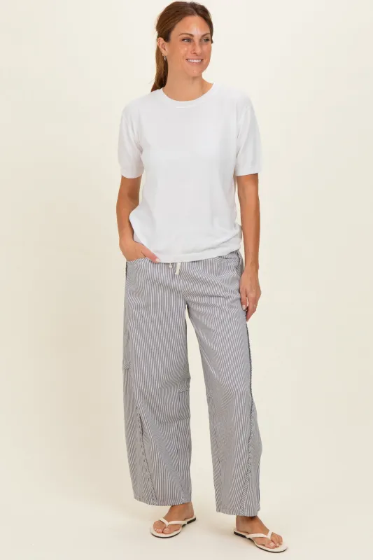Off White Striped Relaxed Fit Pants made by Pinkblush
