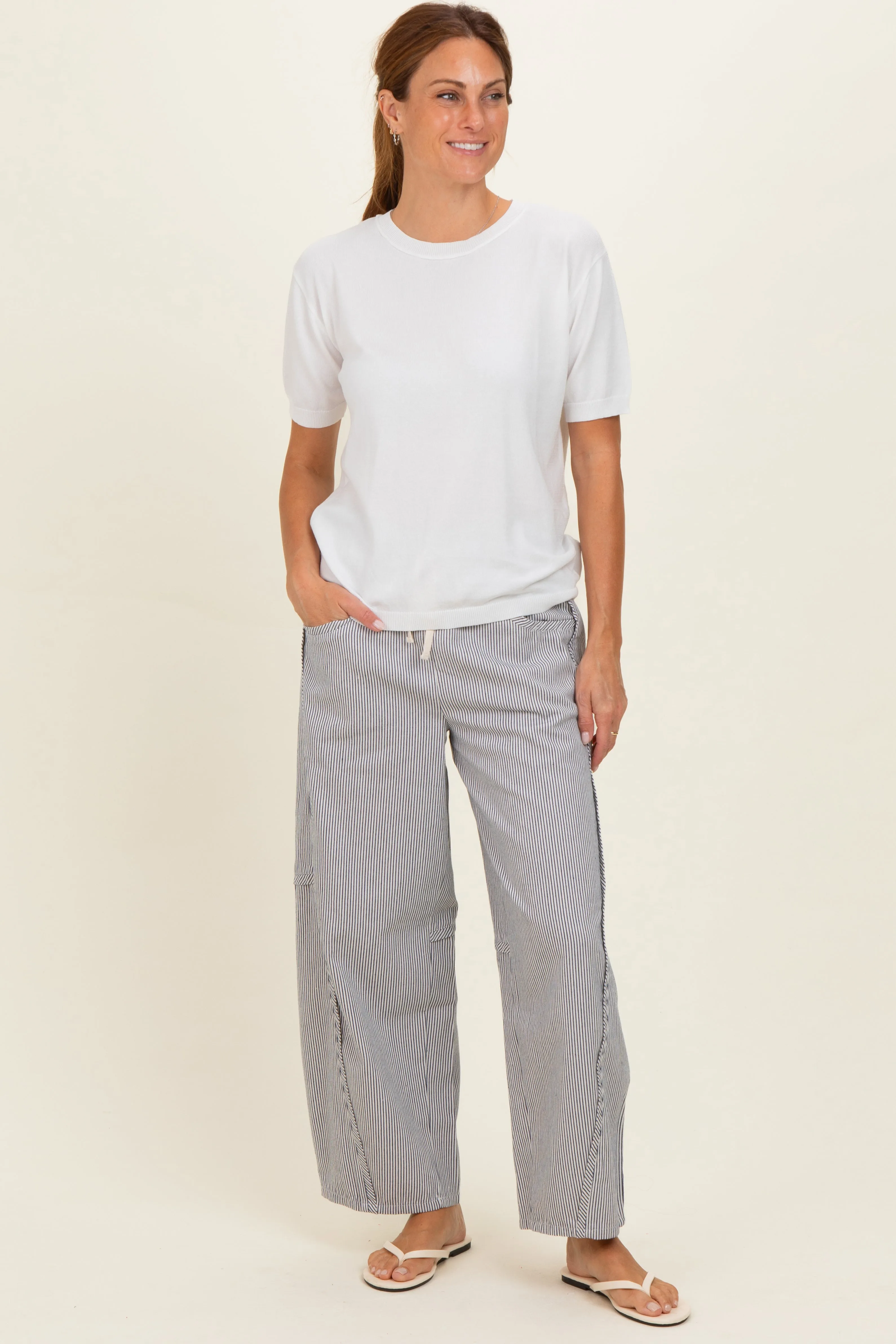 Off White Striped Relaxed Fit Pants sold by Pinkblush