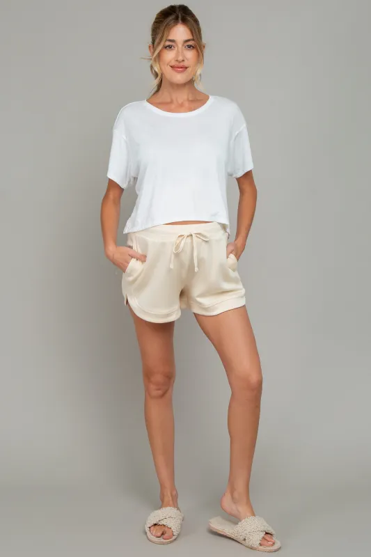 Cream Drawstring Relaxed Fit Maternity Shorts made by HYFVE