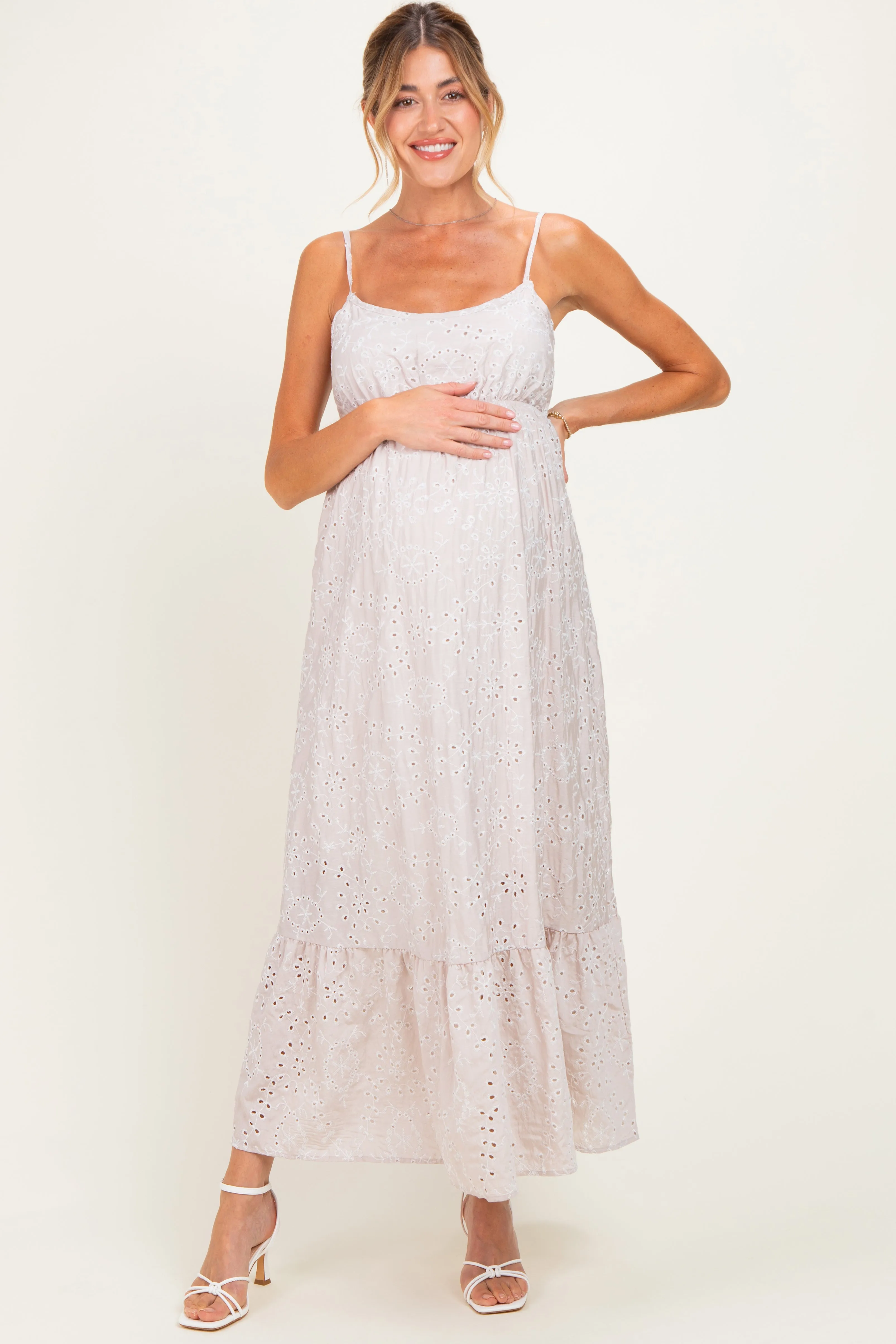 Beige Eyelet Lace Sleeveless Ruffle Hem Maternity Maxi Dress sold by Pinkblush