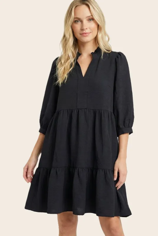 Black Ruffle Split Neck Tiered Dress made by Staccato