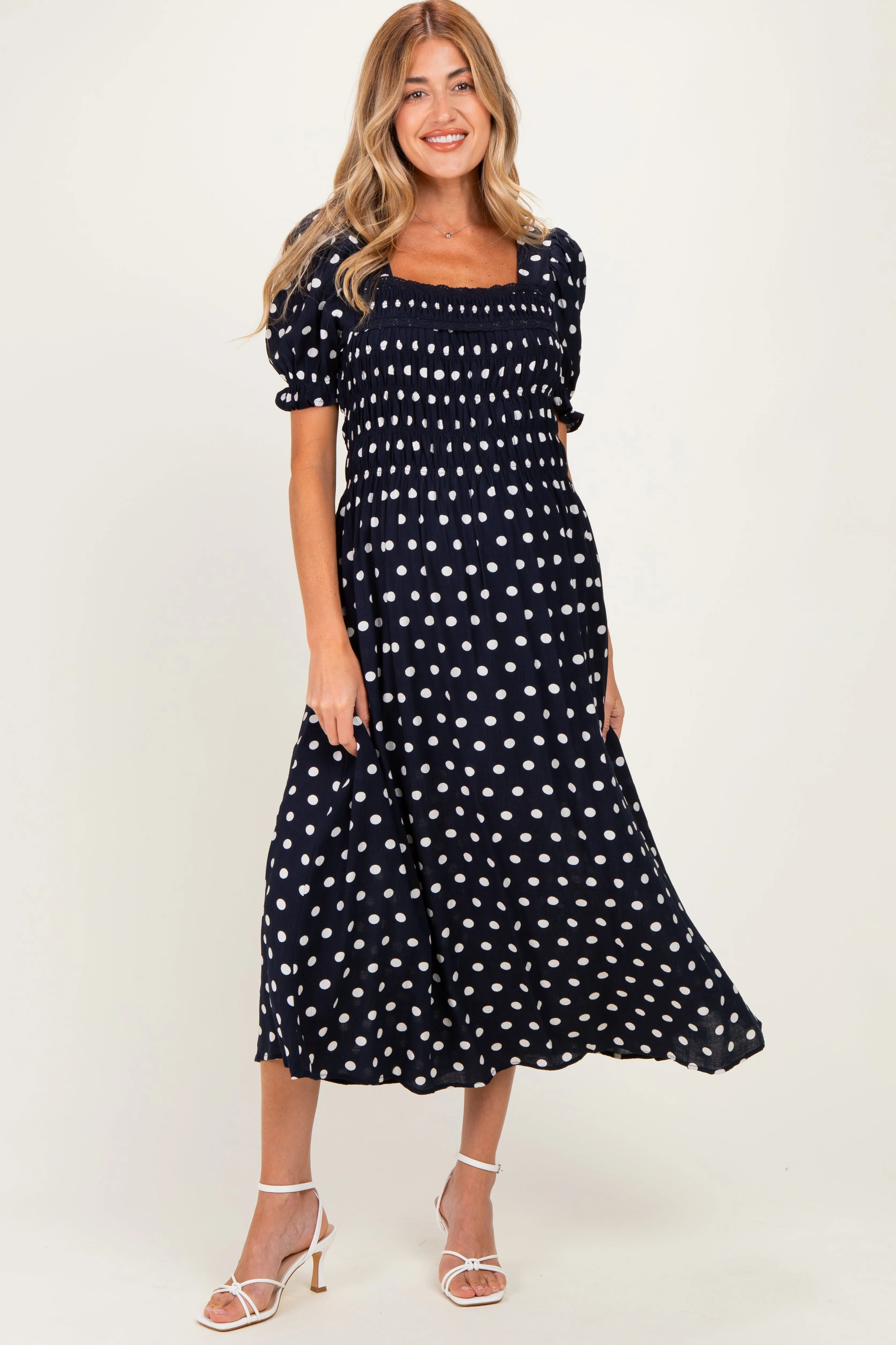 Navy Polka Dot Smocked Maternity Midi Dress sold by Pinkblush