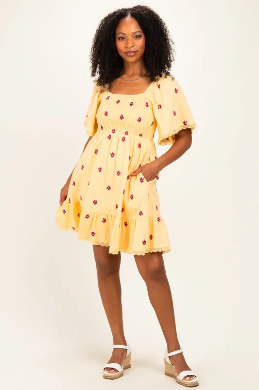 Yellow Floral Embroidered Smocked Dress made by Jnna