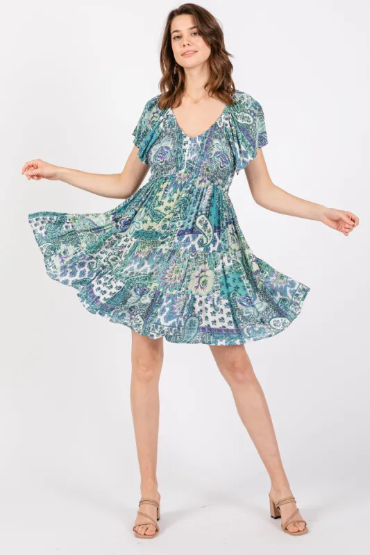 Aqua Floral Ruffle Sleeve Dress sold by Pinkblush
