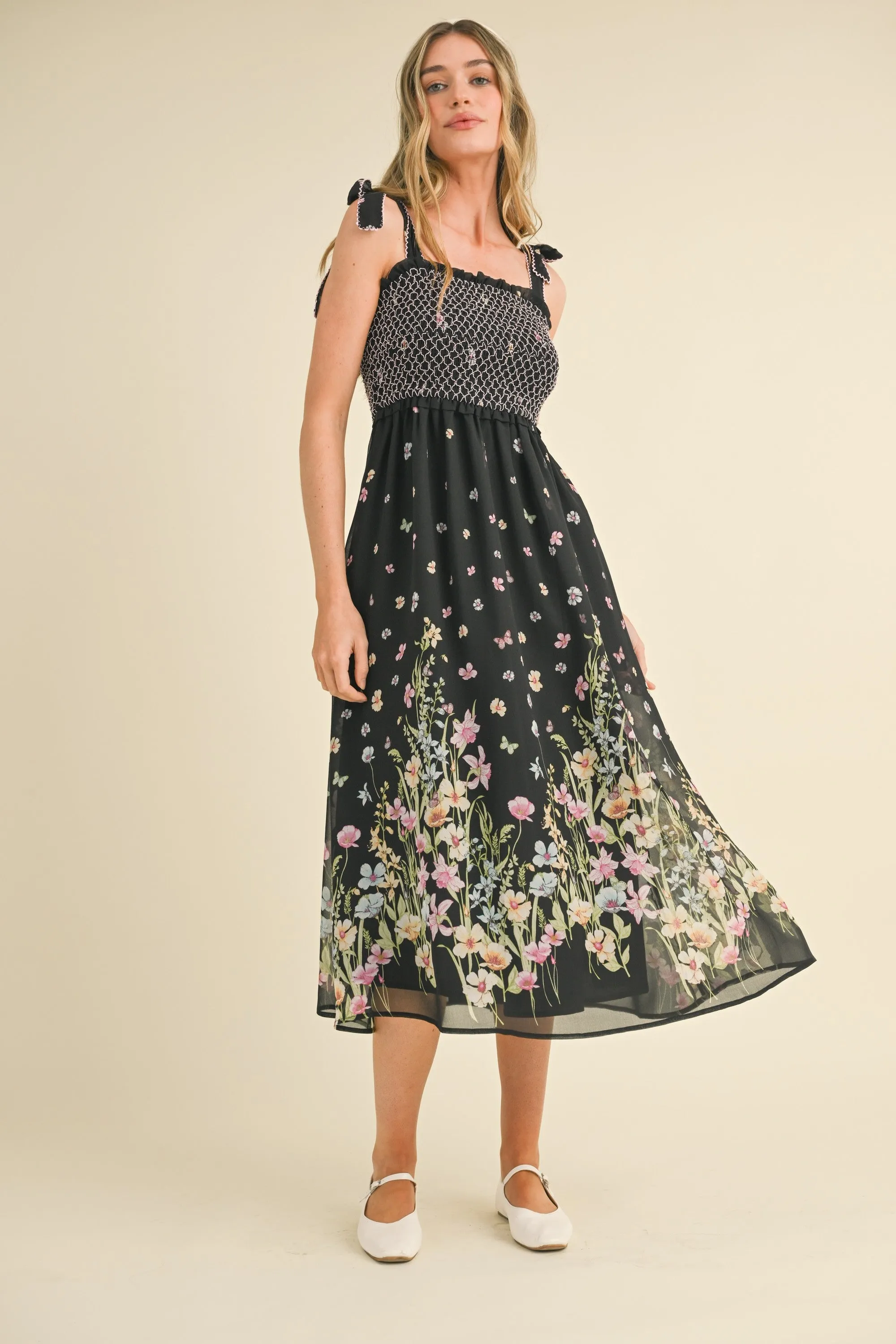 Black Multi Floral Contrast Thread Smocked Floral Midi Dress sold by Pinkblush