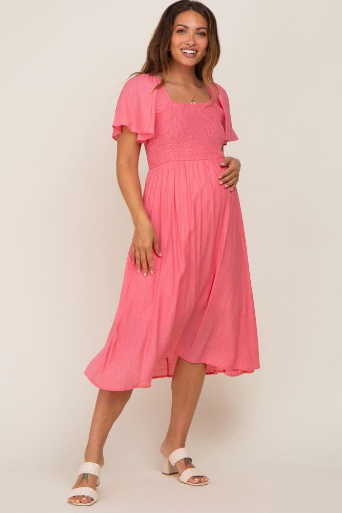 Coral Smocked Square Neck Flutter Short Sleeve Maternity Midi Dress sold by Pinkblush