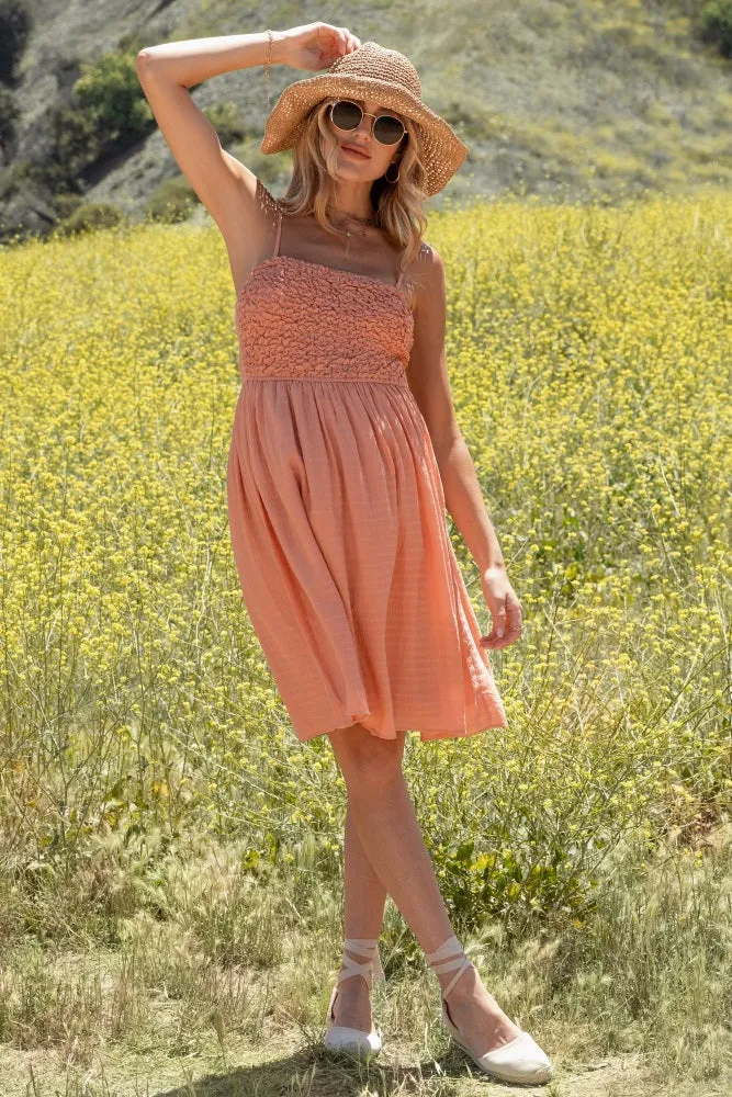 Salmon Textured Smocked Maternity Dress sold by Pinkblush