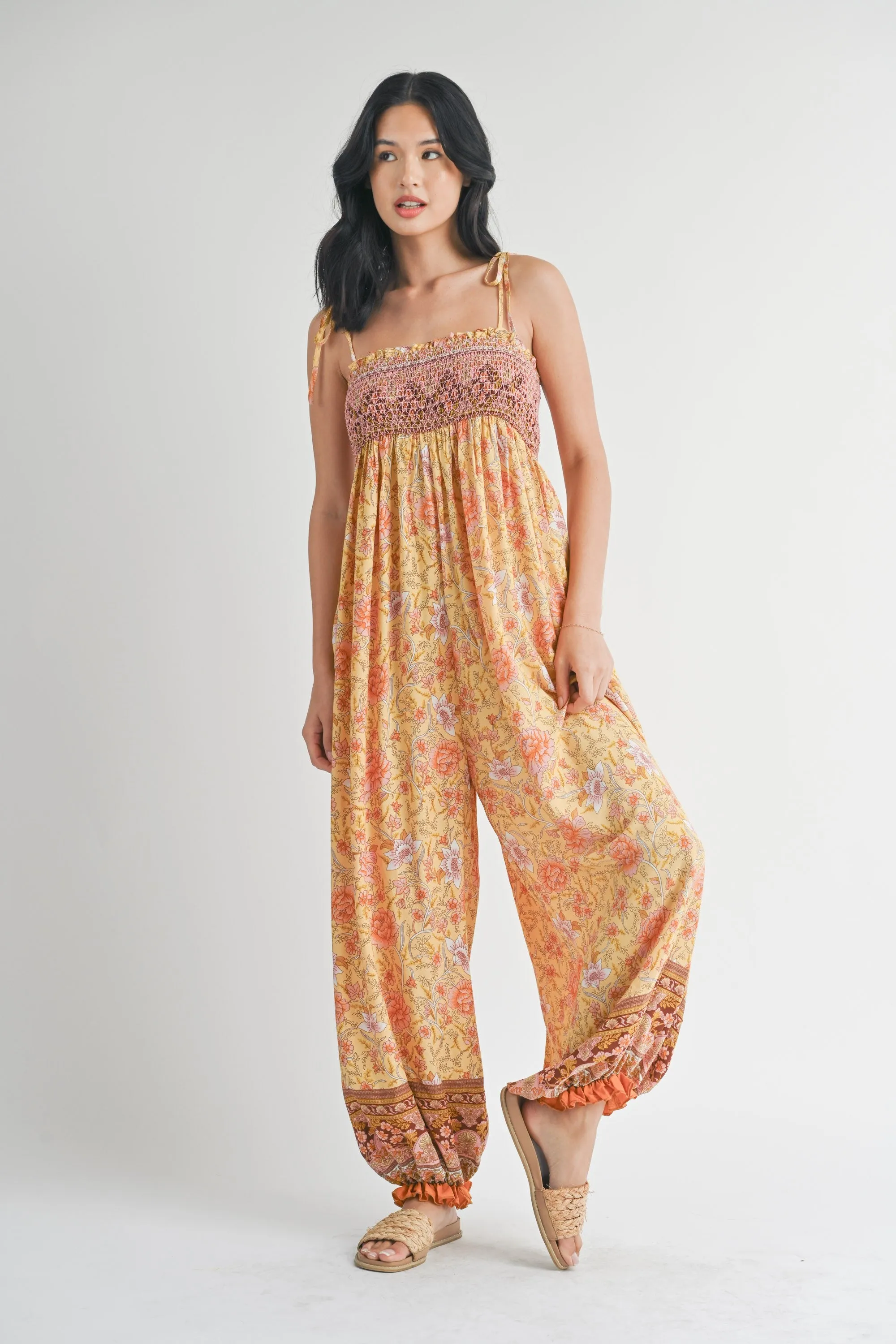 Yellow Floral Border Print Smocked Shoulder Tie Jumpsuit sold by Pinkblush