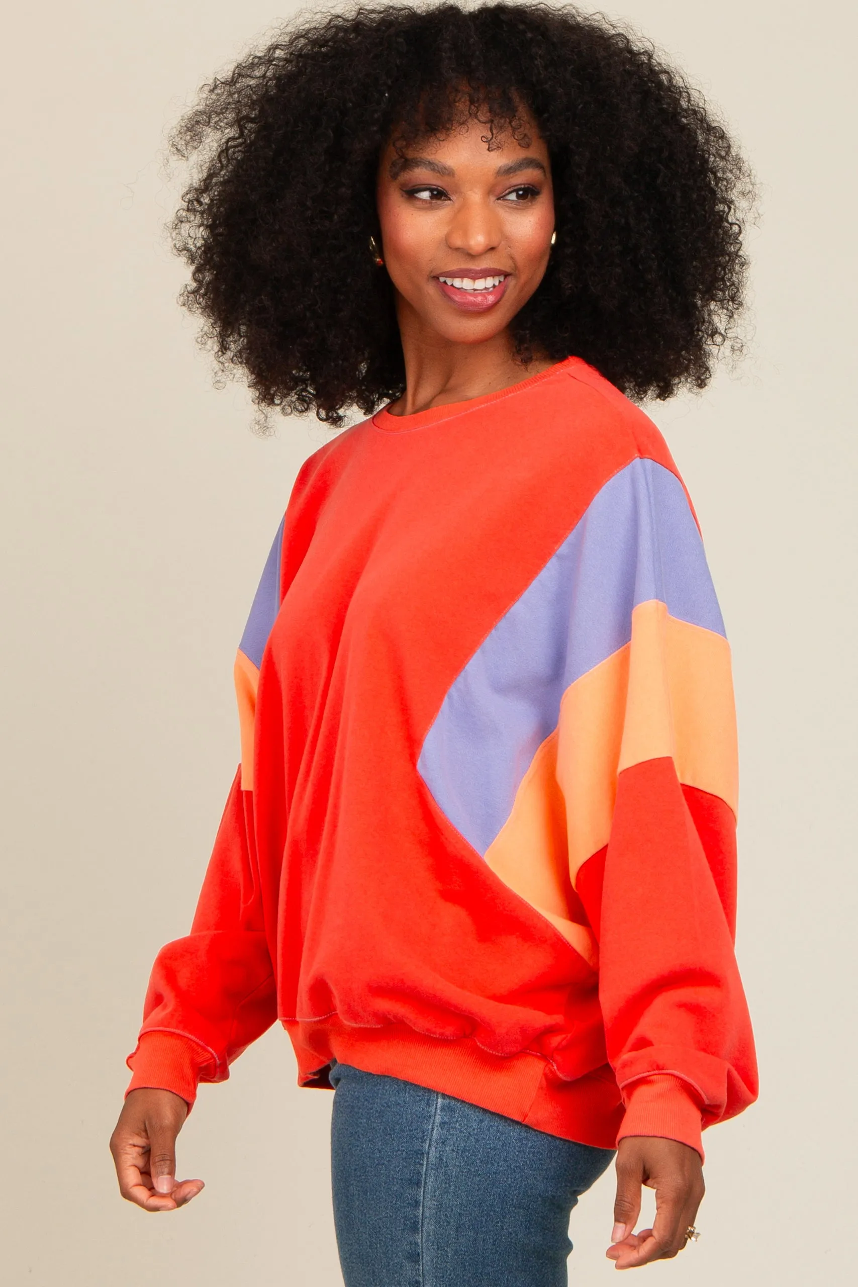 Coral Colorblock Dolman Sleeve Sweatshirt sold by Pinkblush