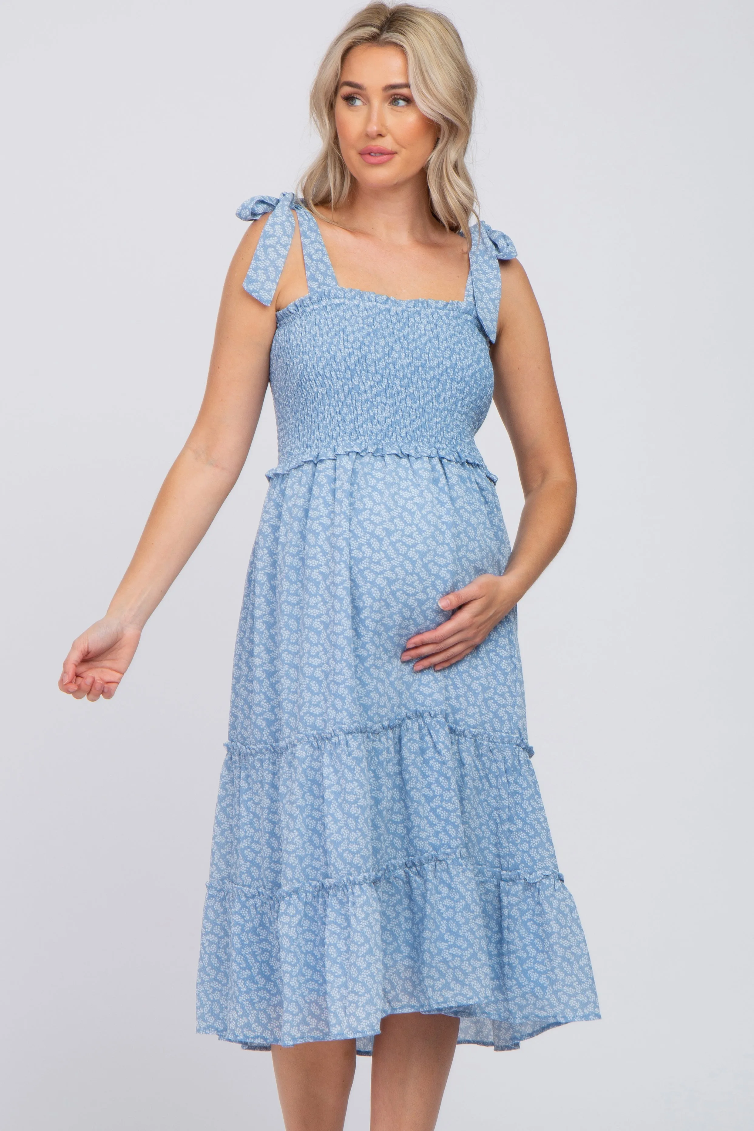 Blue Floral Sleeveless Smocked Tiered Maternity Midi Dress sold by Pinkblush product image thumbnail 4