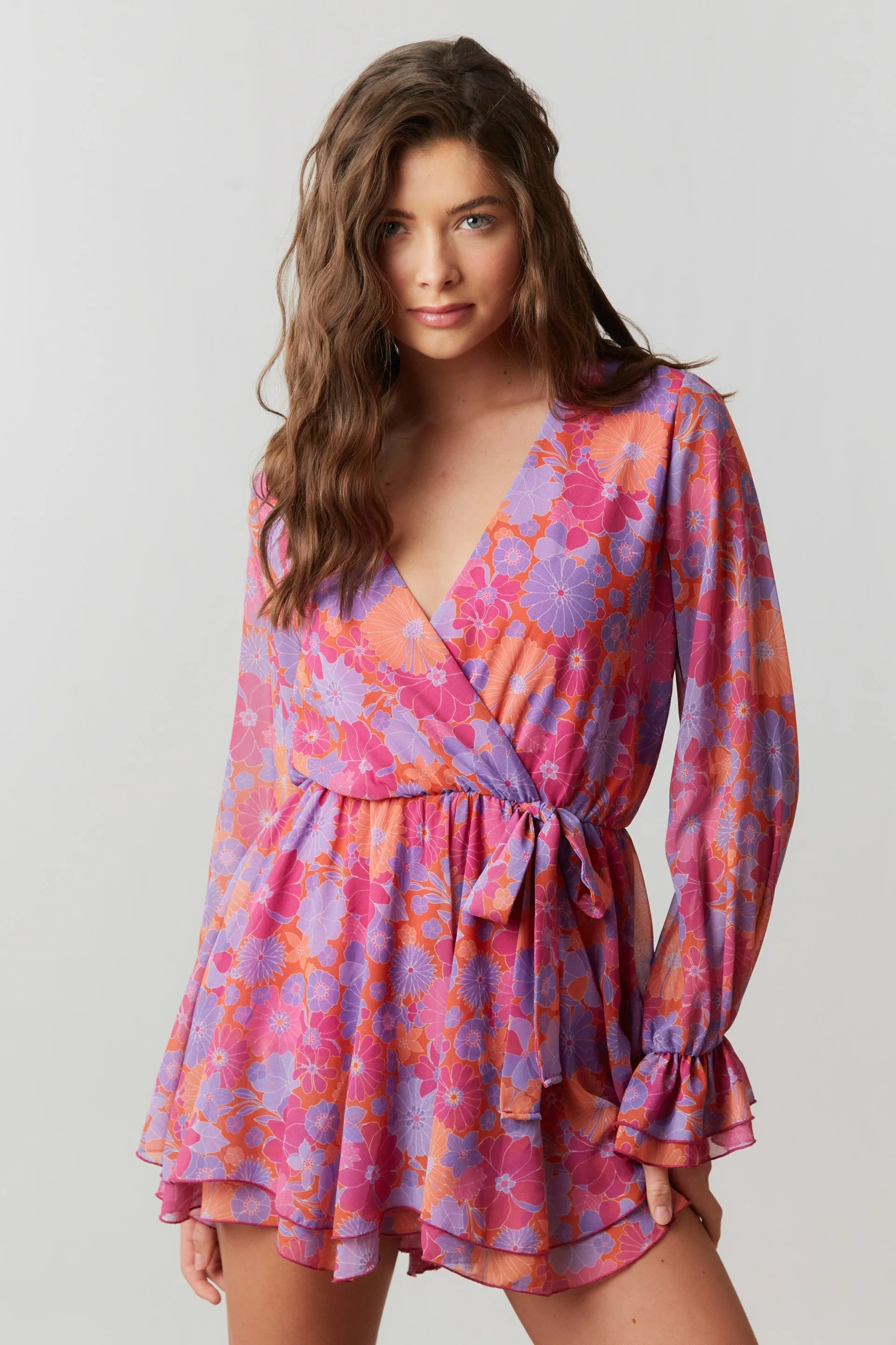 Fuchsia Multi Floral Chiffon Surplice Romper sold by Pinkblush