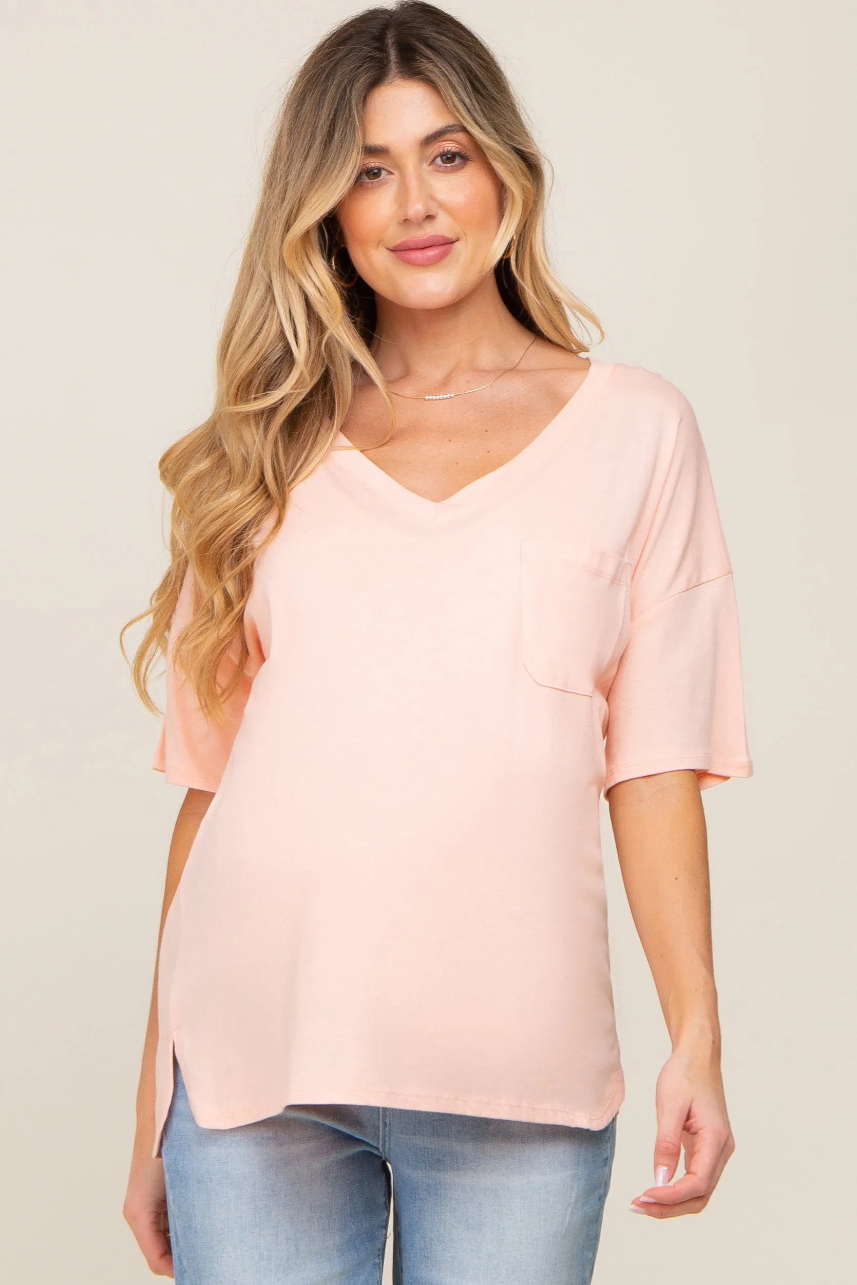 Peach Pocketed V-Neck Maternity Top sold by Pinkblush