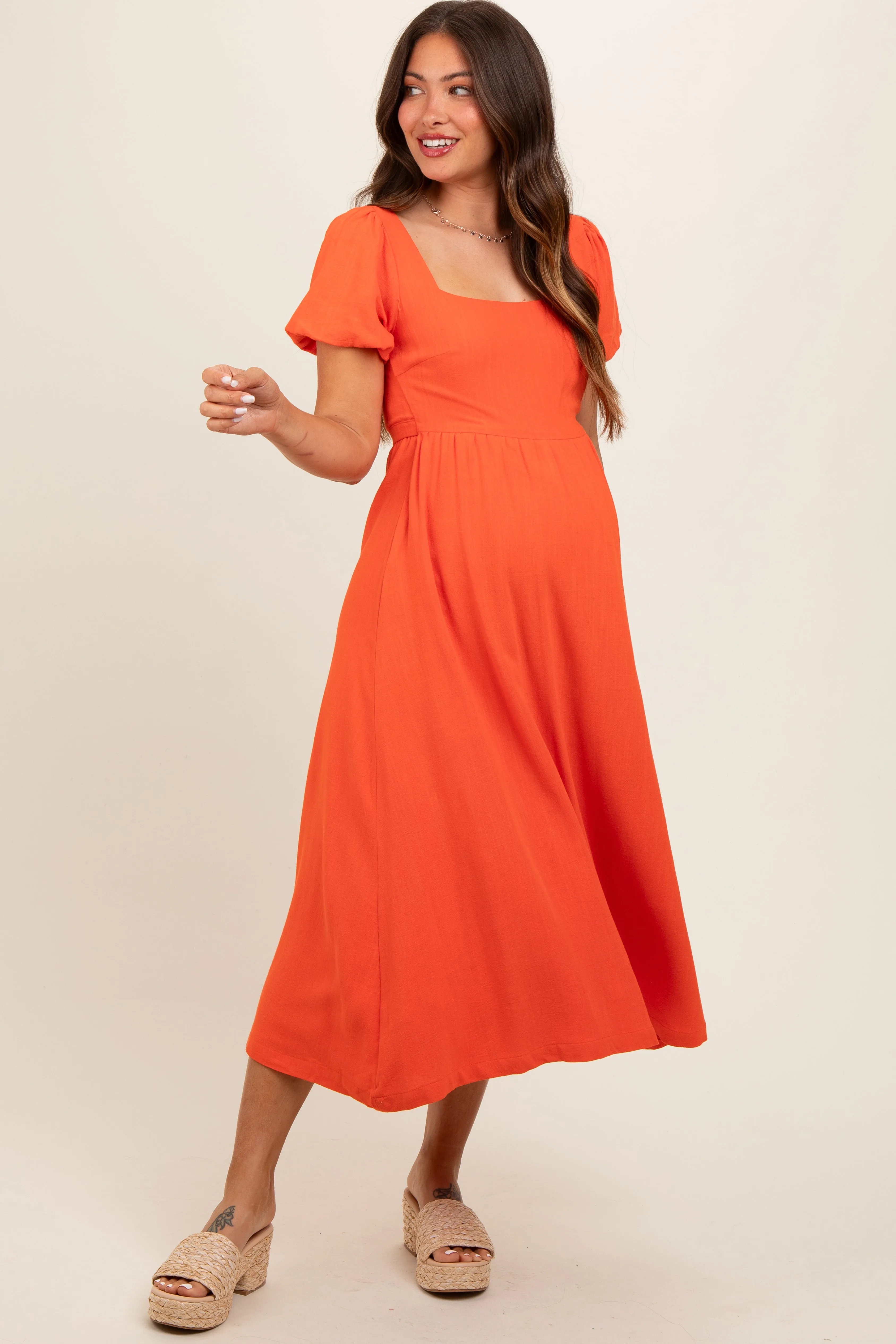 Coral Puff Sleeve Linen Maternity Midi Dress sold by Pinkblush