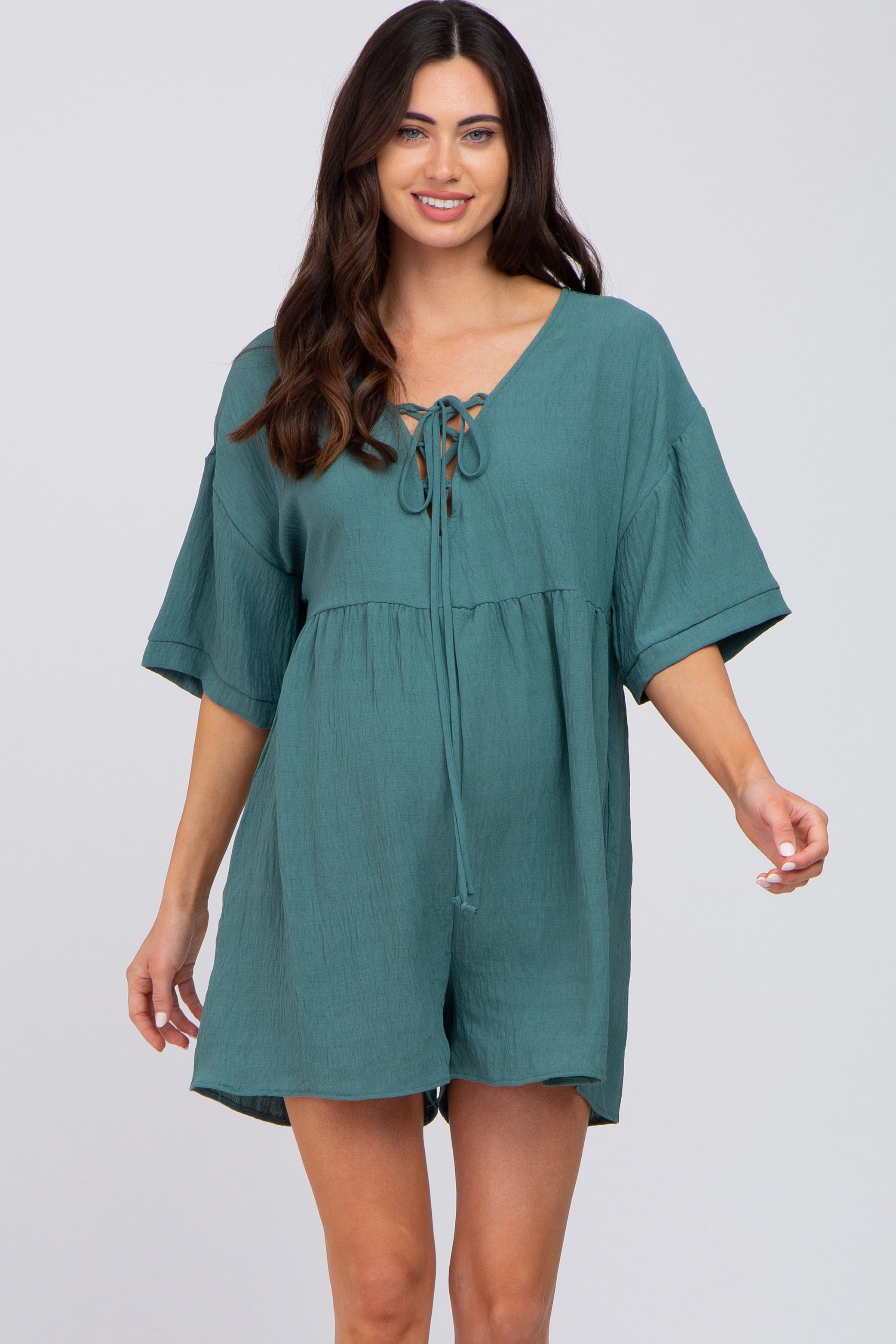 Teal Lace Up Maternity Romper sold by Pinkblush