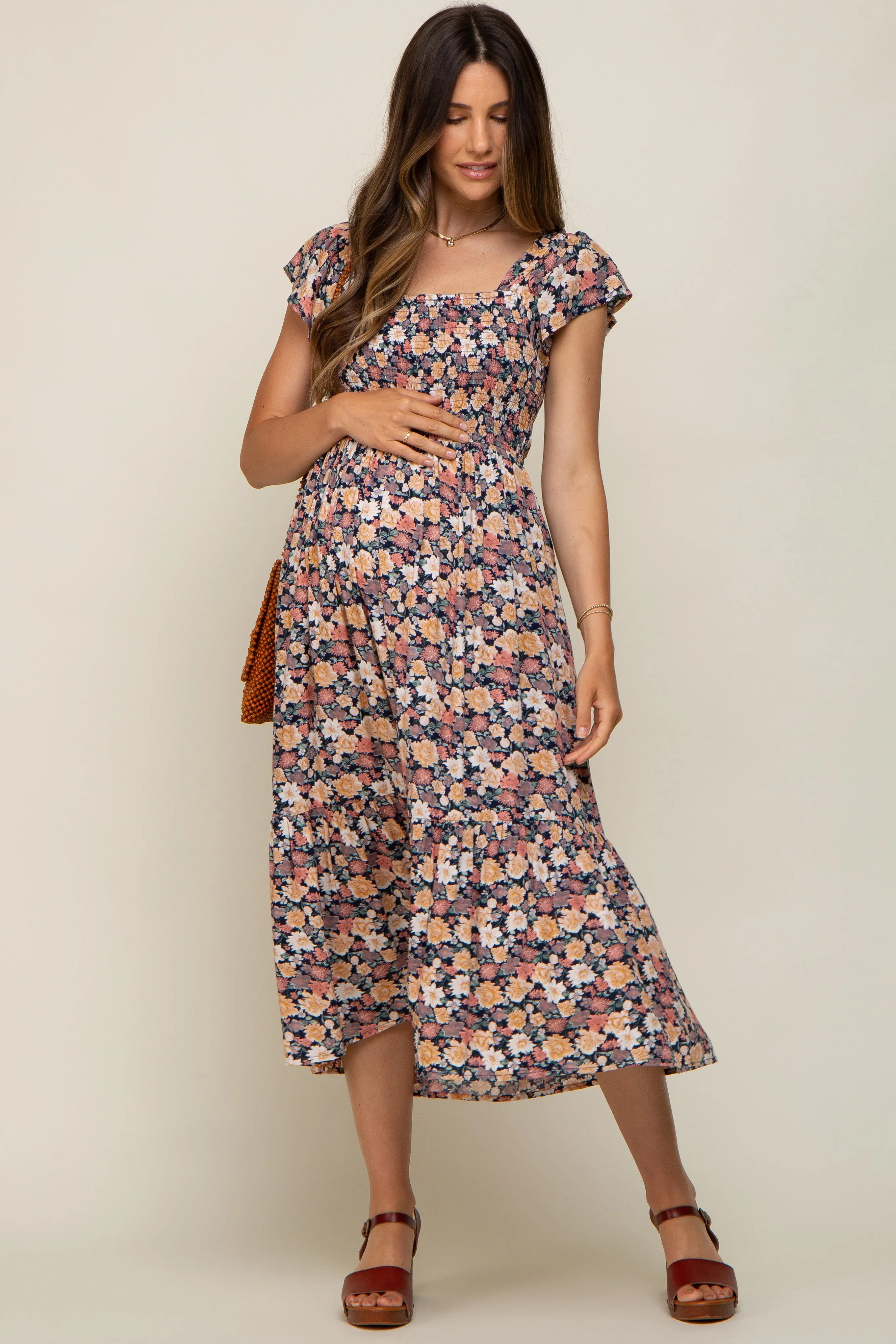 Black Floral Off Shoulder Smocked Maternity Midi Dress sold by Pinkblush