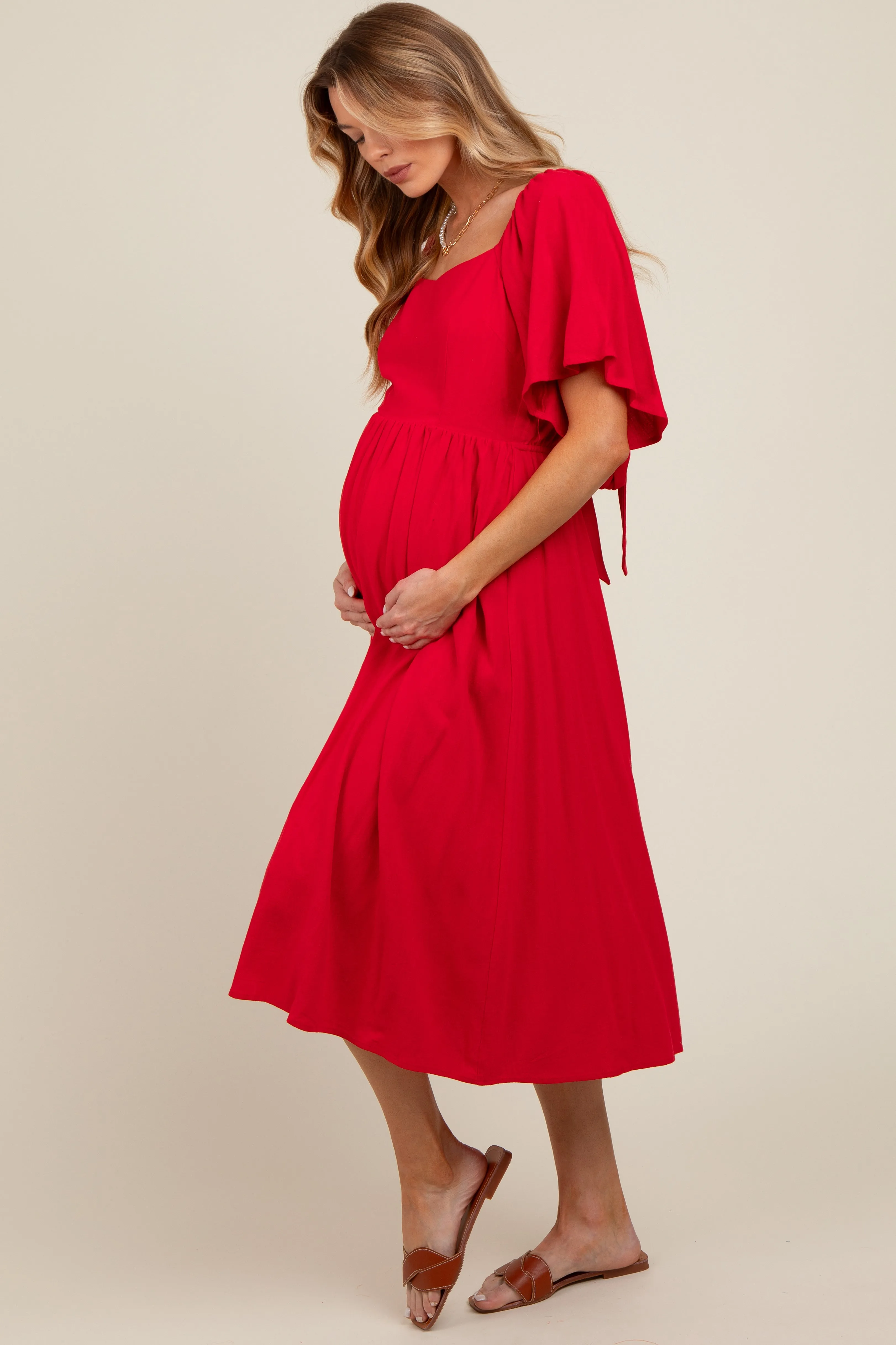 Red Flutter Short Sleeve Back Tie Cutout Maternity Midi Dress sold by Pinkblush product image thumbnail 4