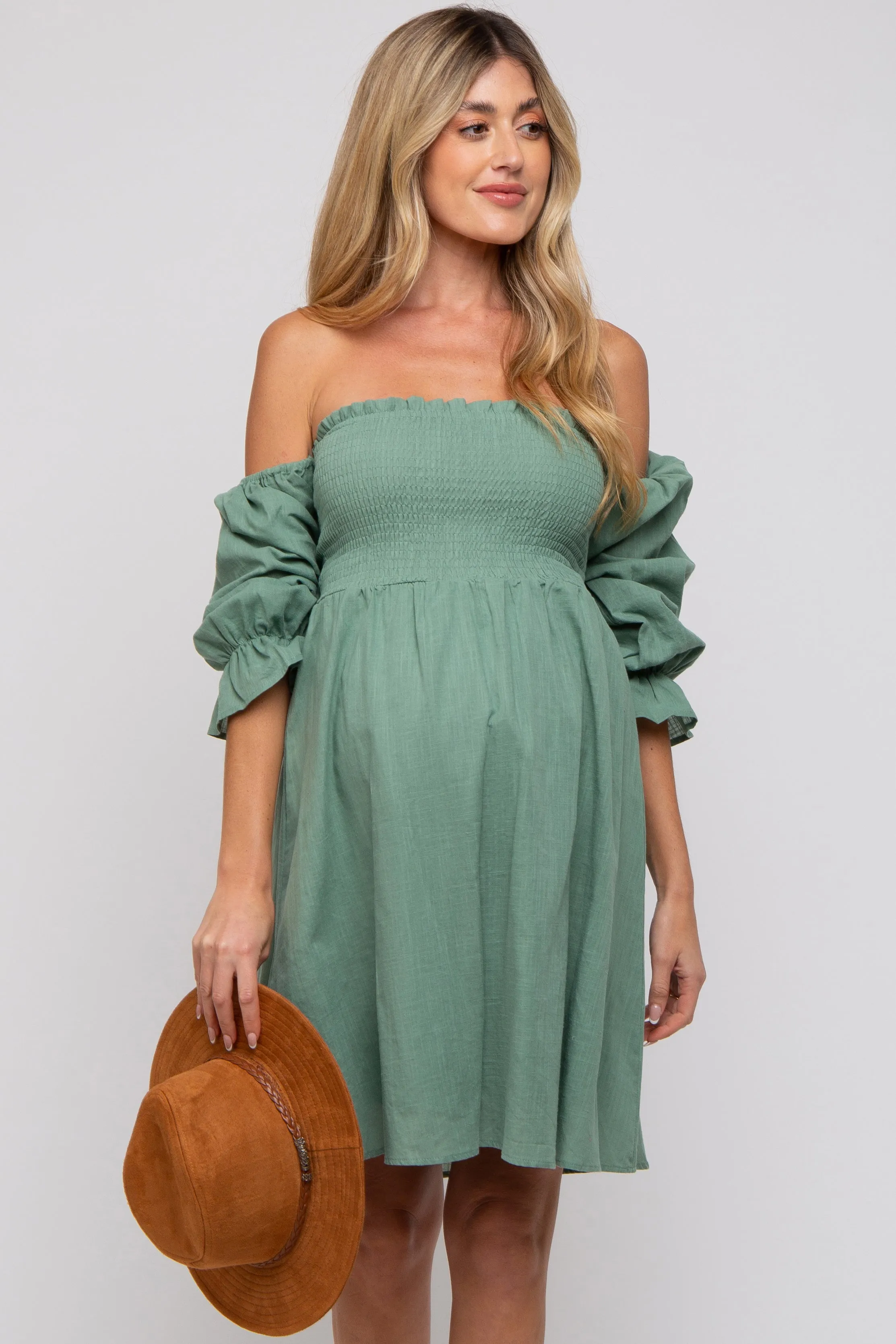 Green Smocked Off Shoulder Long Sleeve Maternity Dress sold by Pinkblush