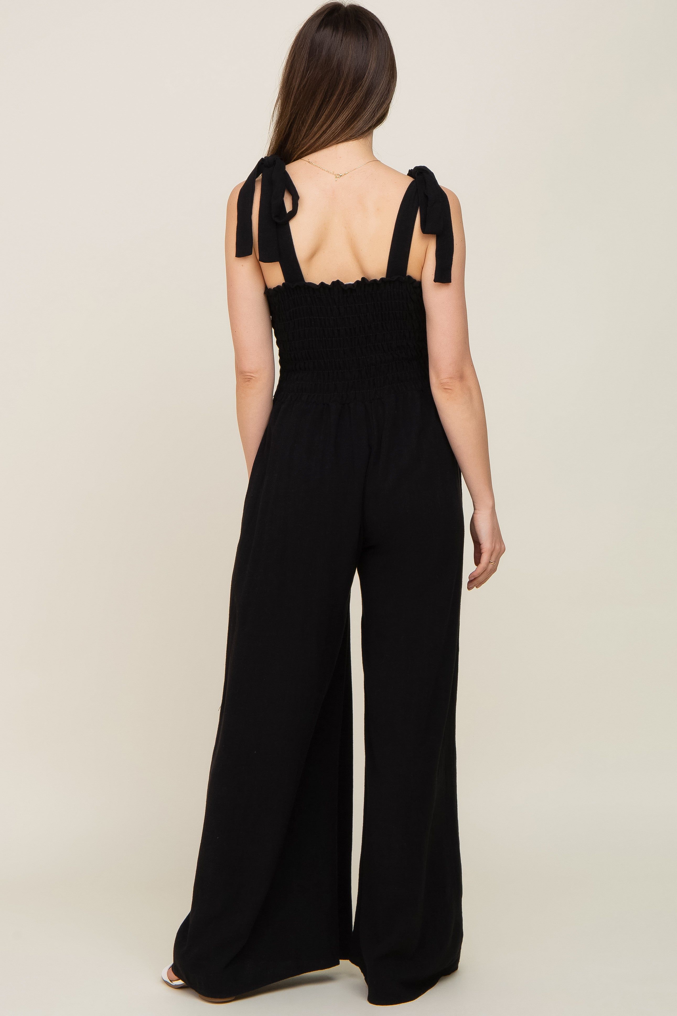 Black Sleeveless Smocked Wide Leg Maternity Jumpsuit sold by Pinkblush product image thumbnail 3