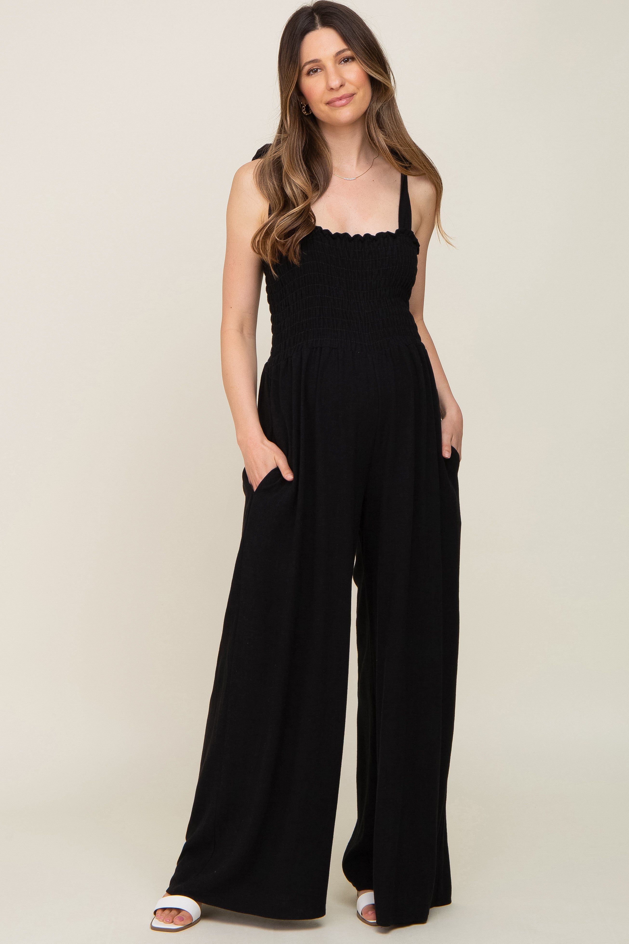 Black Sleeveless Smocked Wide Leg Maternity Jumpsuit sold by Pinkblush