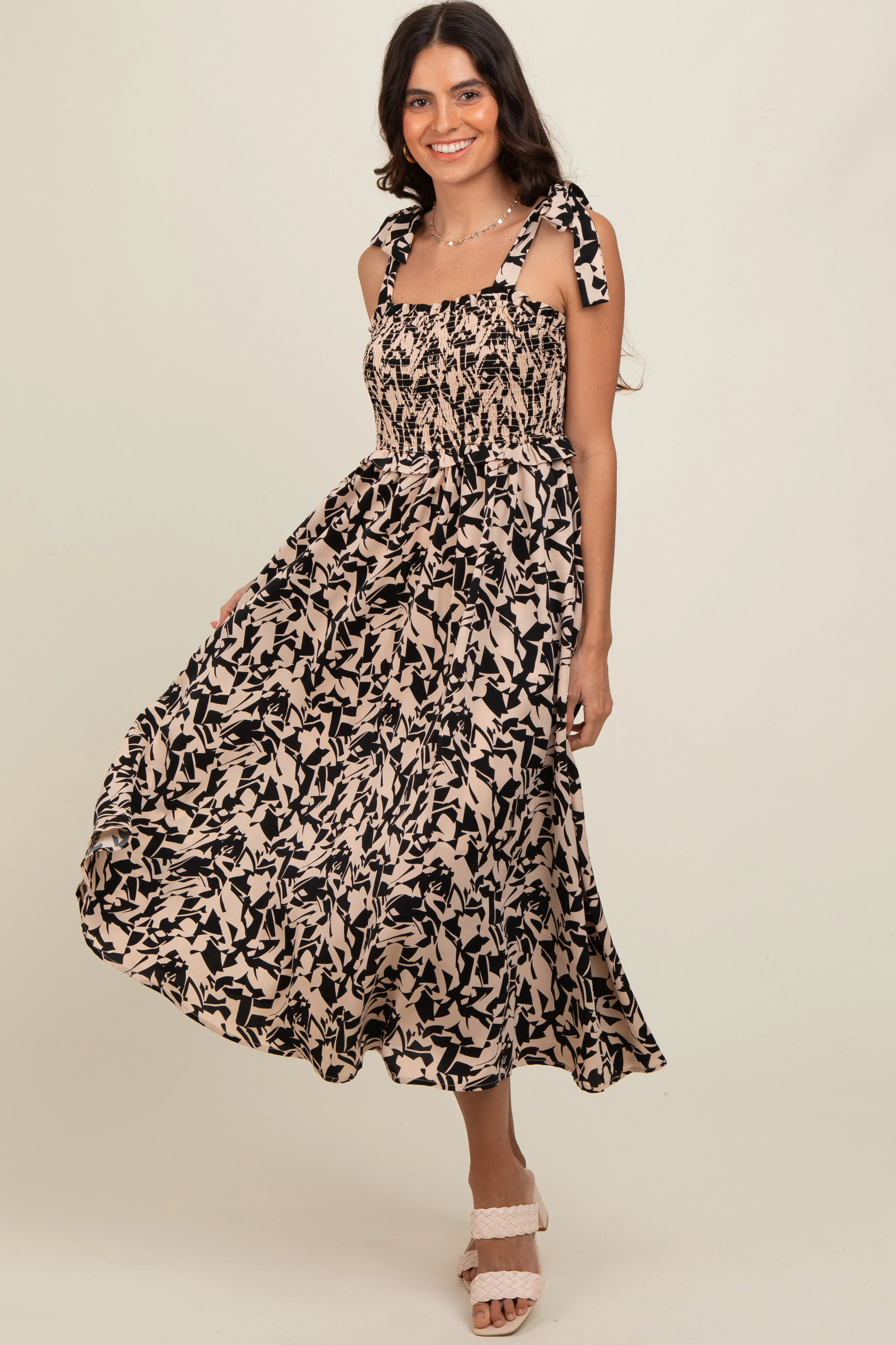 Black Printed Smocked Shoulder Tie Midi Dress sold by Pinkblush