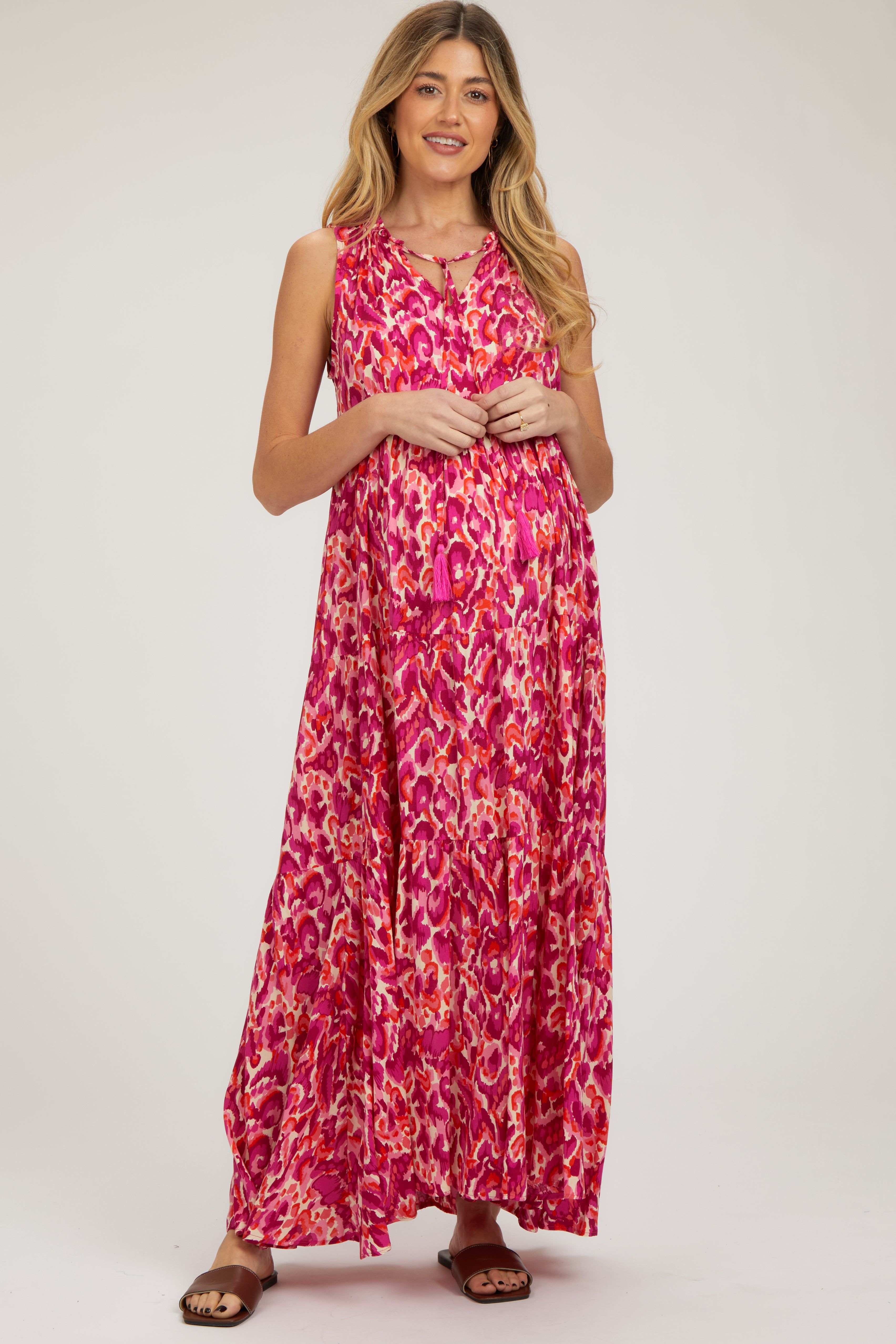 Magenta Sleeveless V-Neck Ruffle Neck Tiered Maternity Maxi Dress sold by Pinkblush