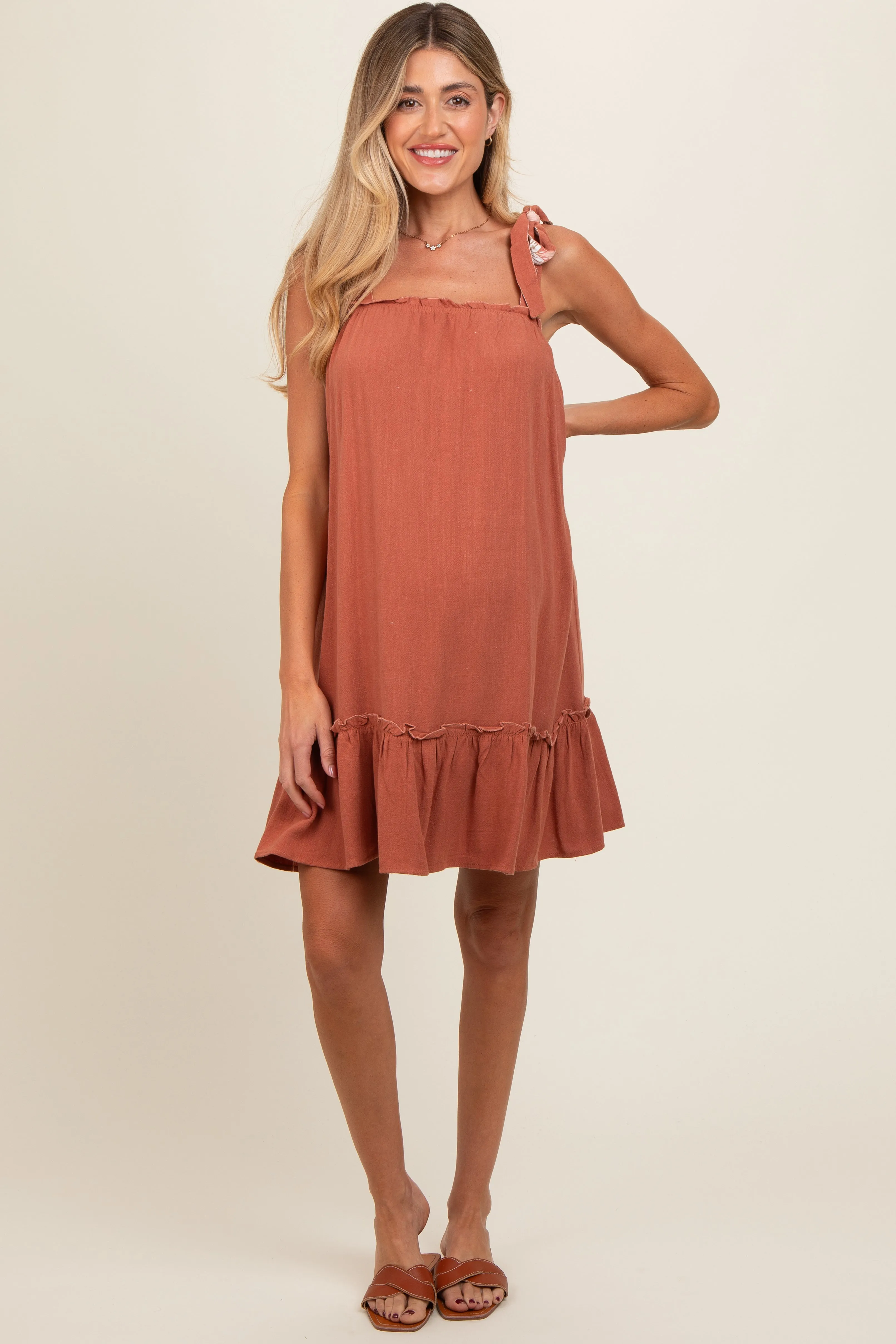 Rust Ruffle Hem Maternity Mini Dress sold by Pinkblush