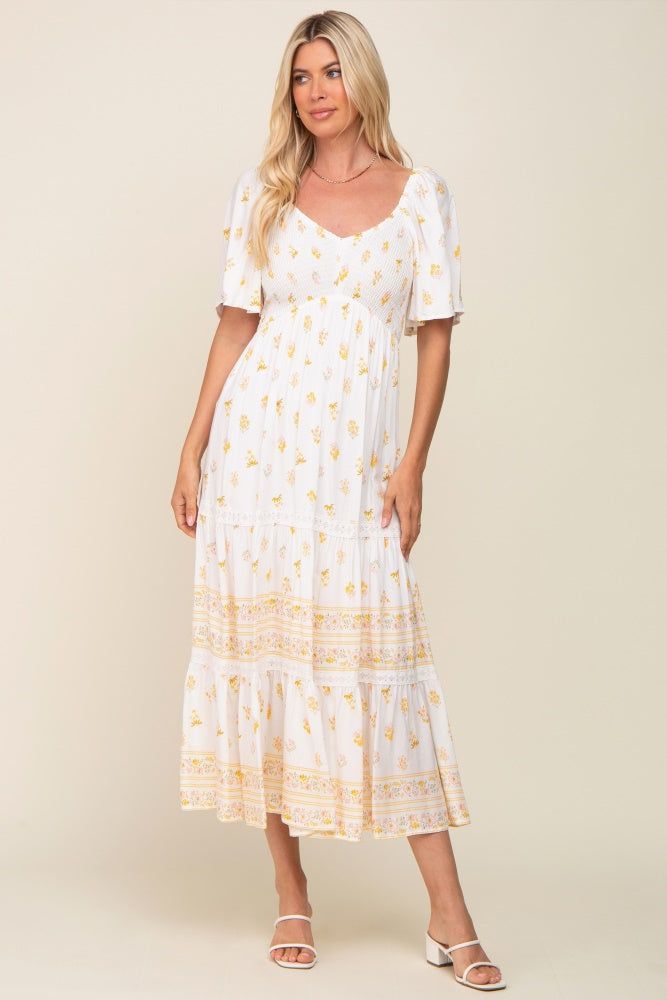 Ivory Floral Flutter Sleeve Midi Dress sold by Pinkblush