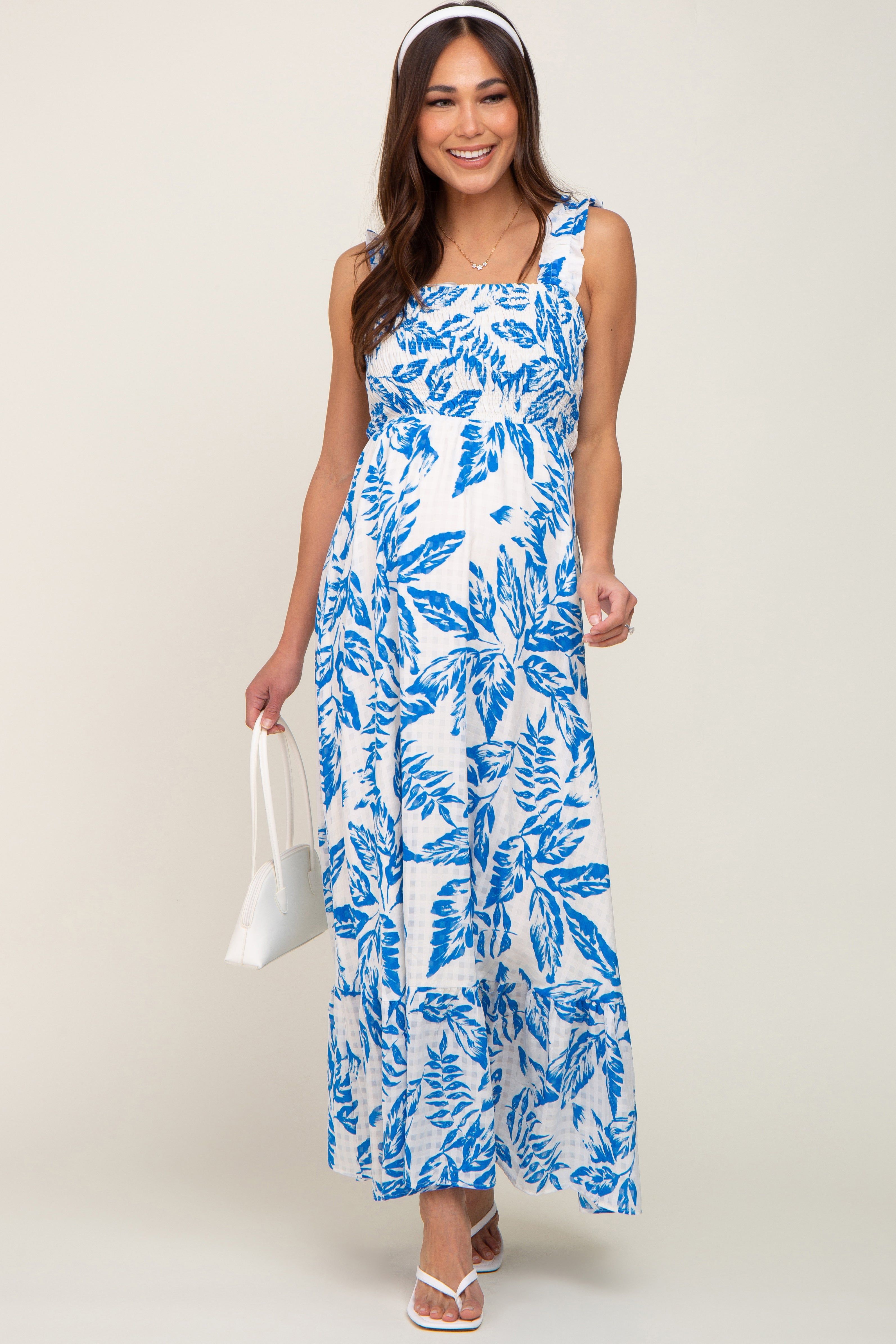 Blue Leaf Printed Smocked Ruffle Maternity Maxi Dress sold by Pinkblush