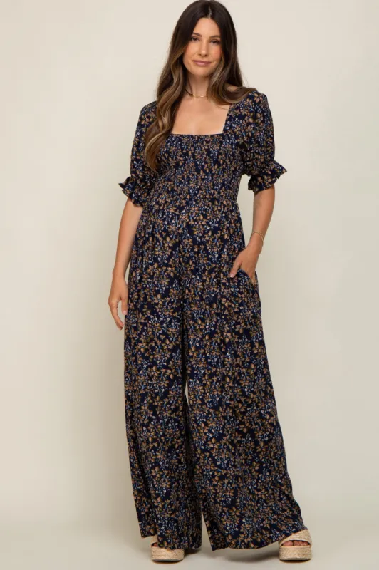 Navy Floral Smocked Maternity Jumpsuit sold by Pinkblush