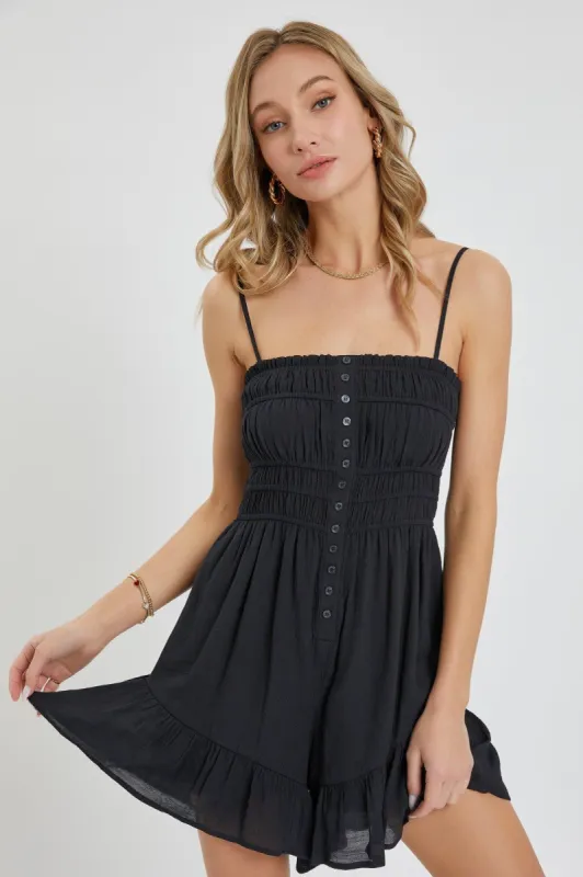 Black Smocked Romper sold by Pinkblush