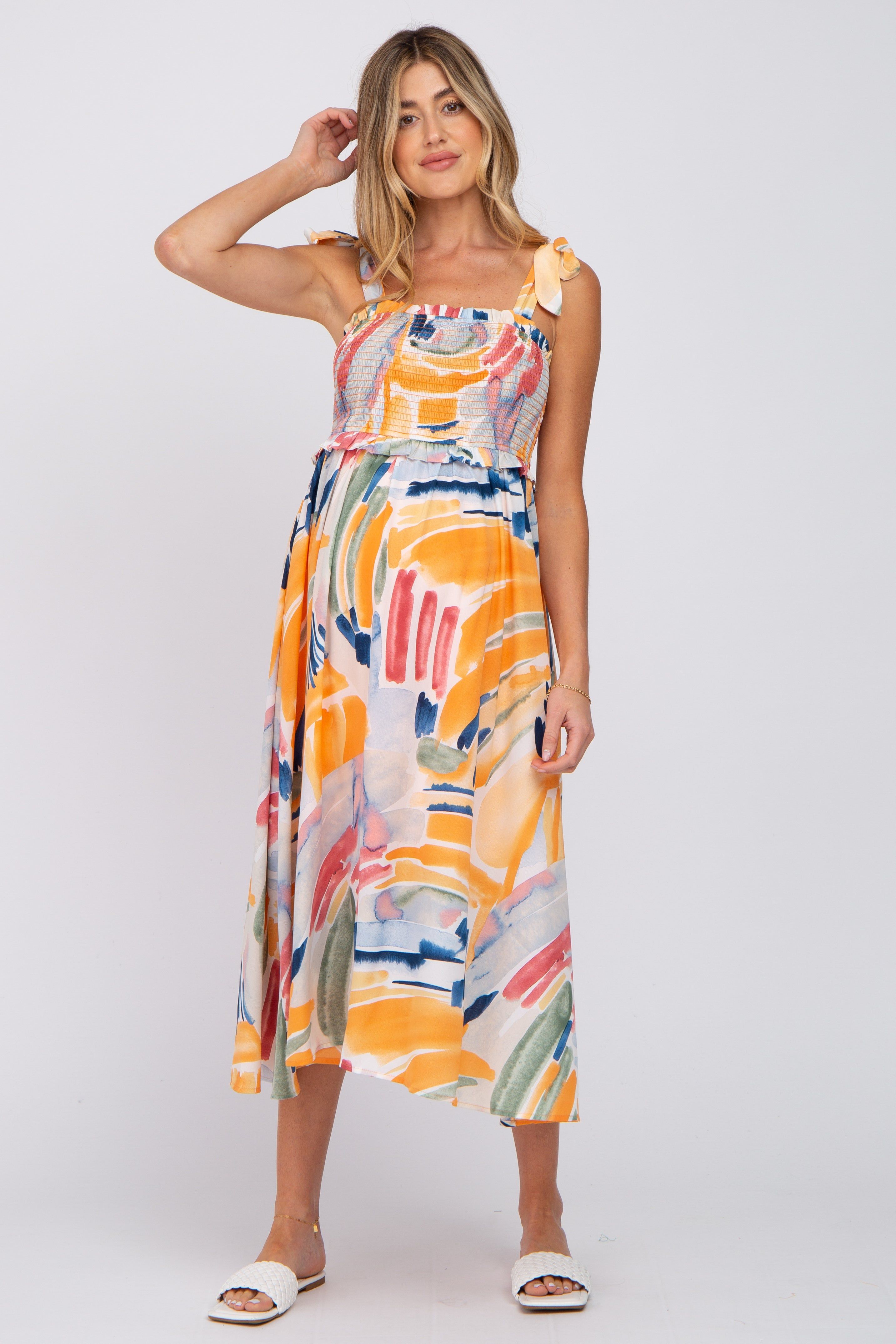 Blue Multi-Colored Stroke Print Smocked Maternity Midi Dress sold by Pinkblush