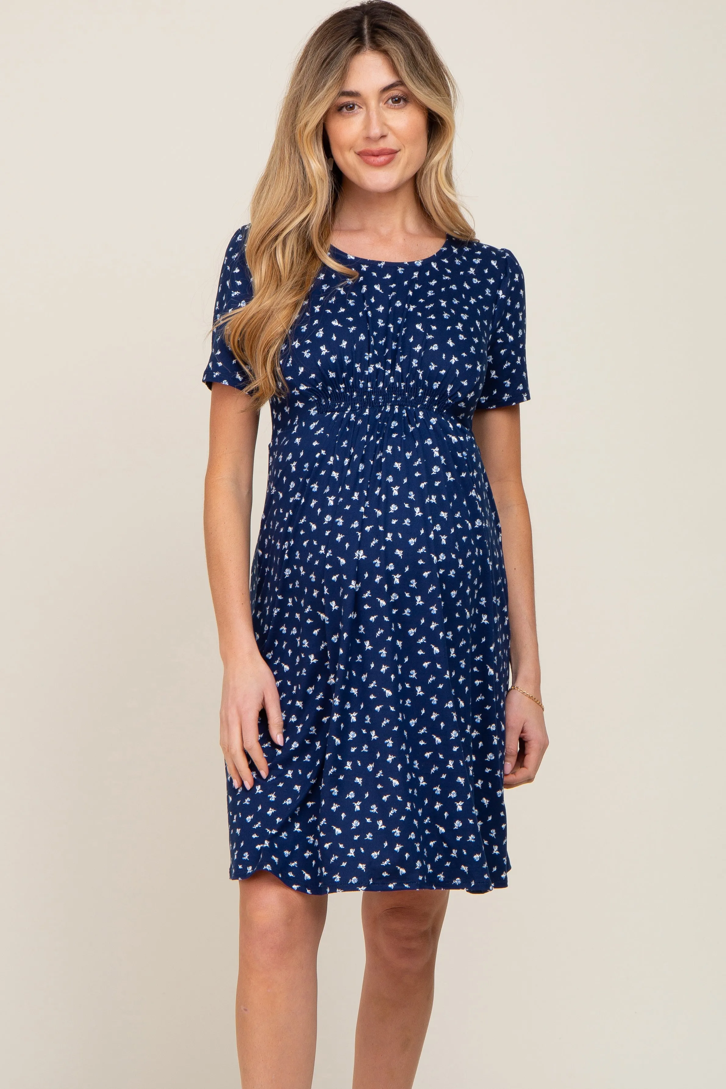 Navy Floral Smocked Short Sleeve Maternity Dress sold by Pinkblush