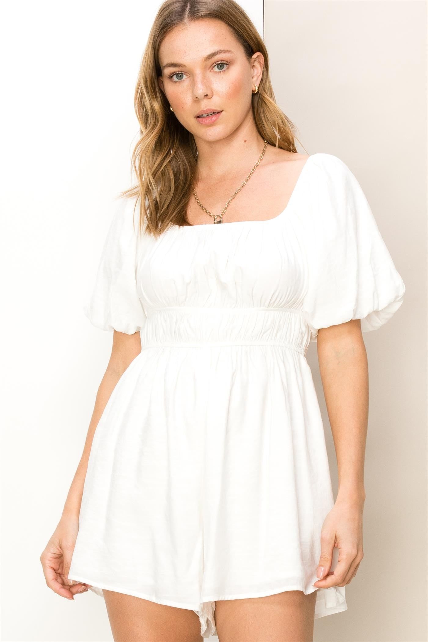 Off White Short Sleeve Romper sold by Pinkblush