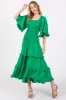Green Smocked Ruffle Tiered Maternity Midi Dress sold by Pinkblush