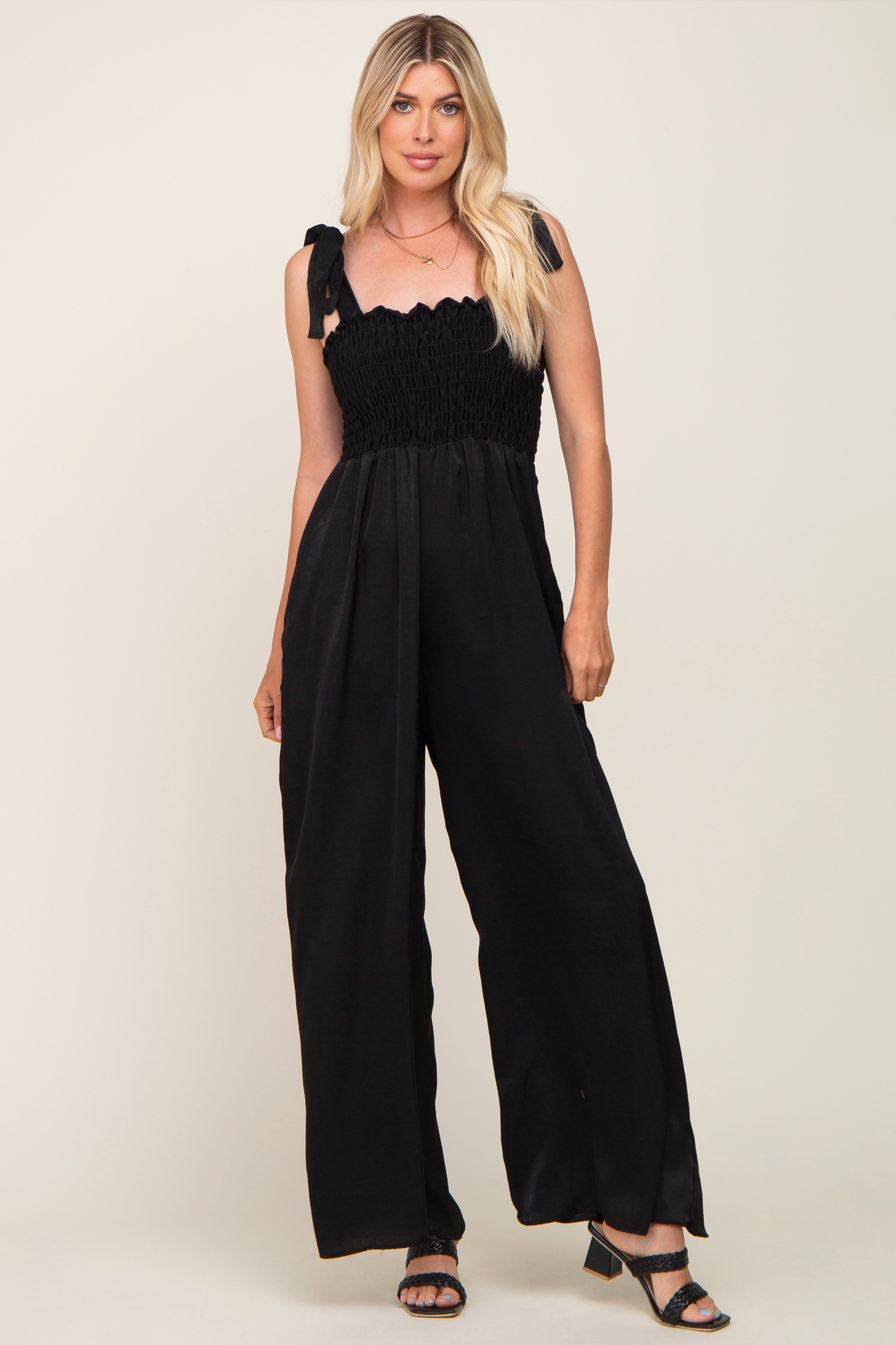 Black Satin Smocked Square Neck Shoulder Tie Jumpsuit sold by Pinkblush