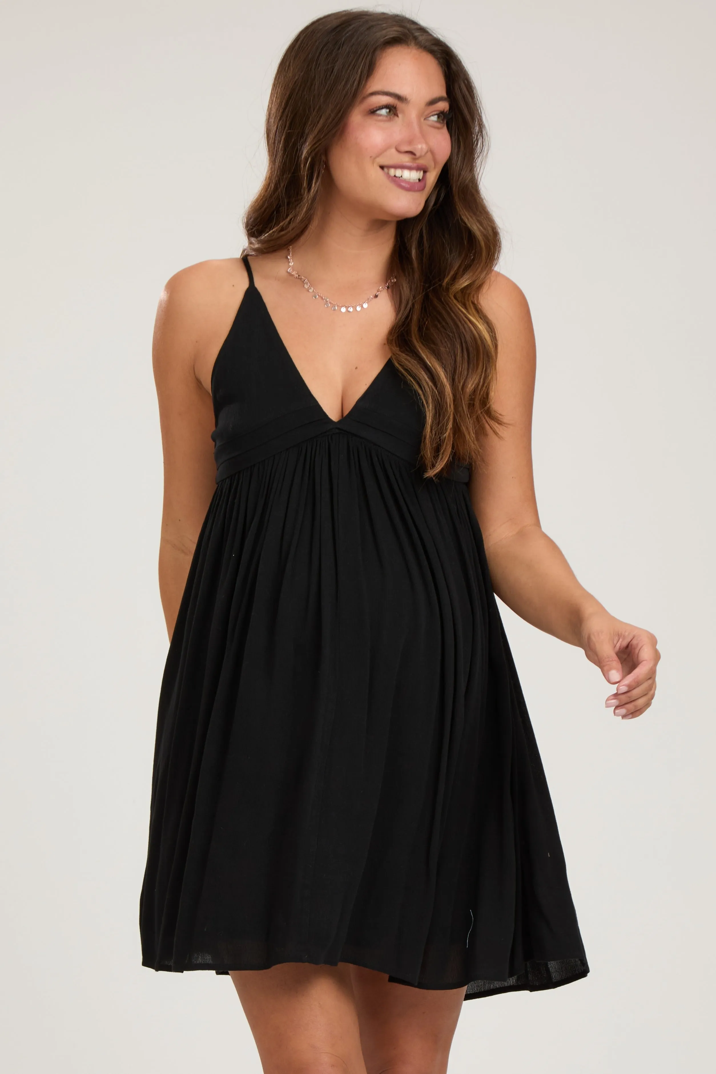 Black Sleeveless Deep V-Neck Maternity Dress sold by Pinkblush