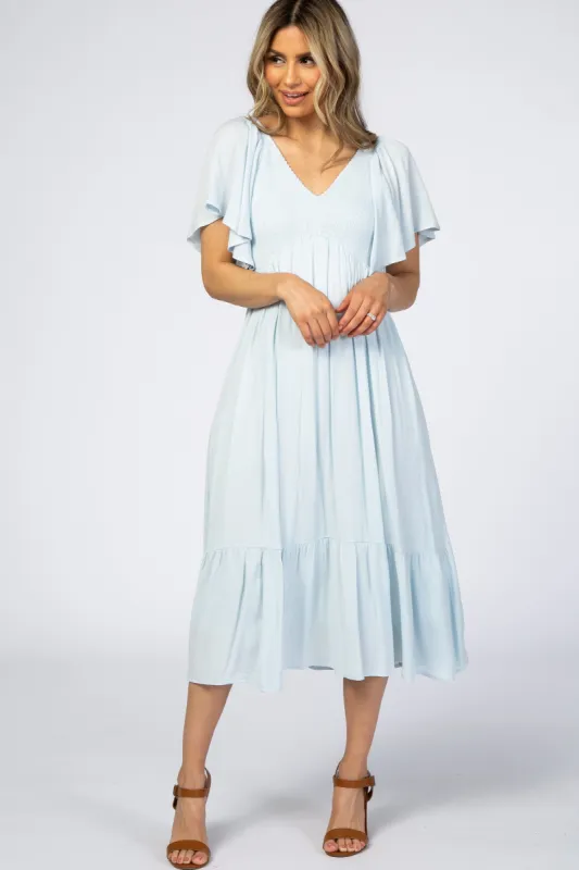 Light Blue Smocked Ruffle Dress sold by Pinkblush