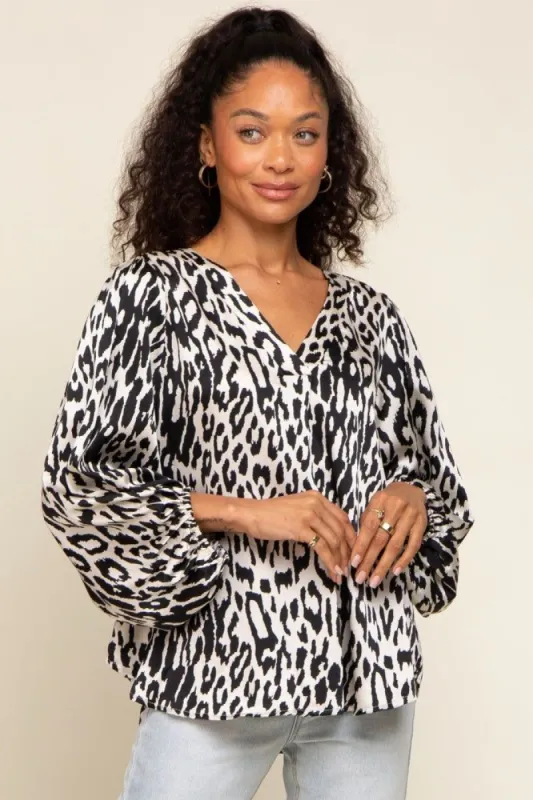 Black Animal Print Balloon Sleeve Top sold by Pinkblush