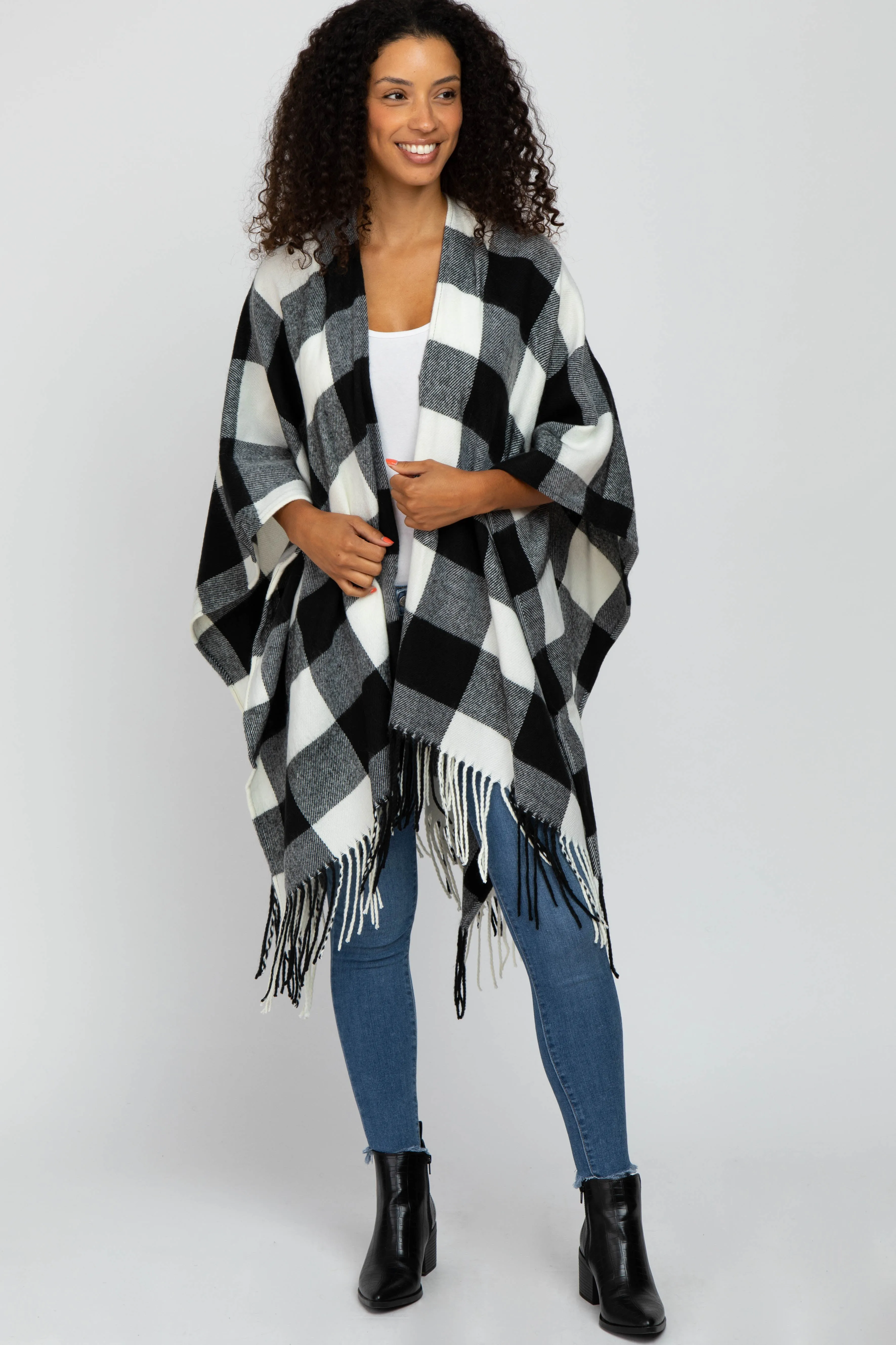Ivory Plaid Fringe Poncho sold by Pinkblush