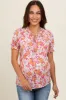 Magenta Floral Ruffle Tie Maternity Blouse sold by Pinkblush