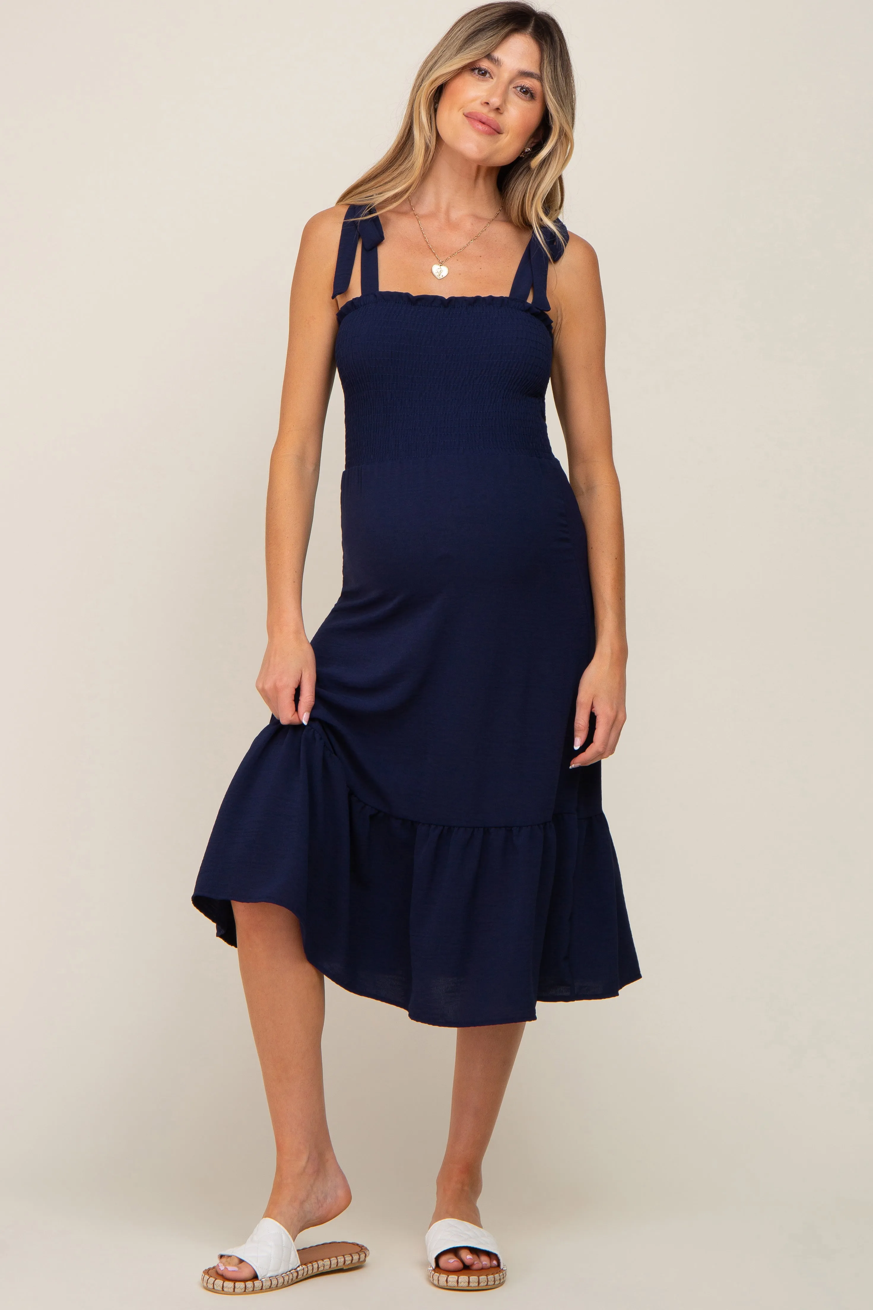 Navy Smocked Shoulder Tie Maternity Midi Dress sold by Pinkblush