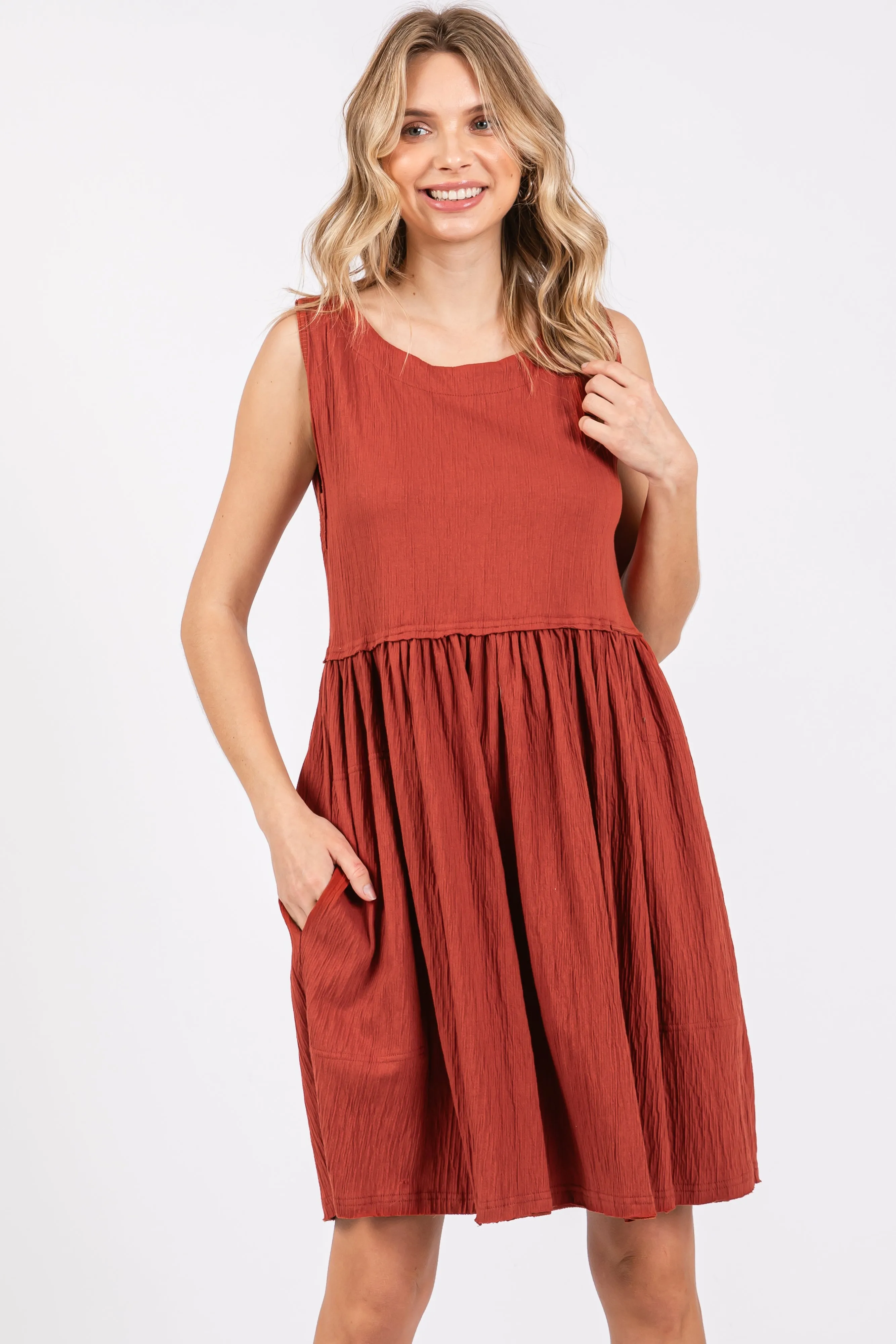 Rust Sleeveless Textured Dress sold by Pinkblush