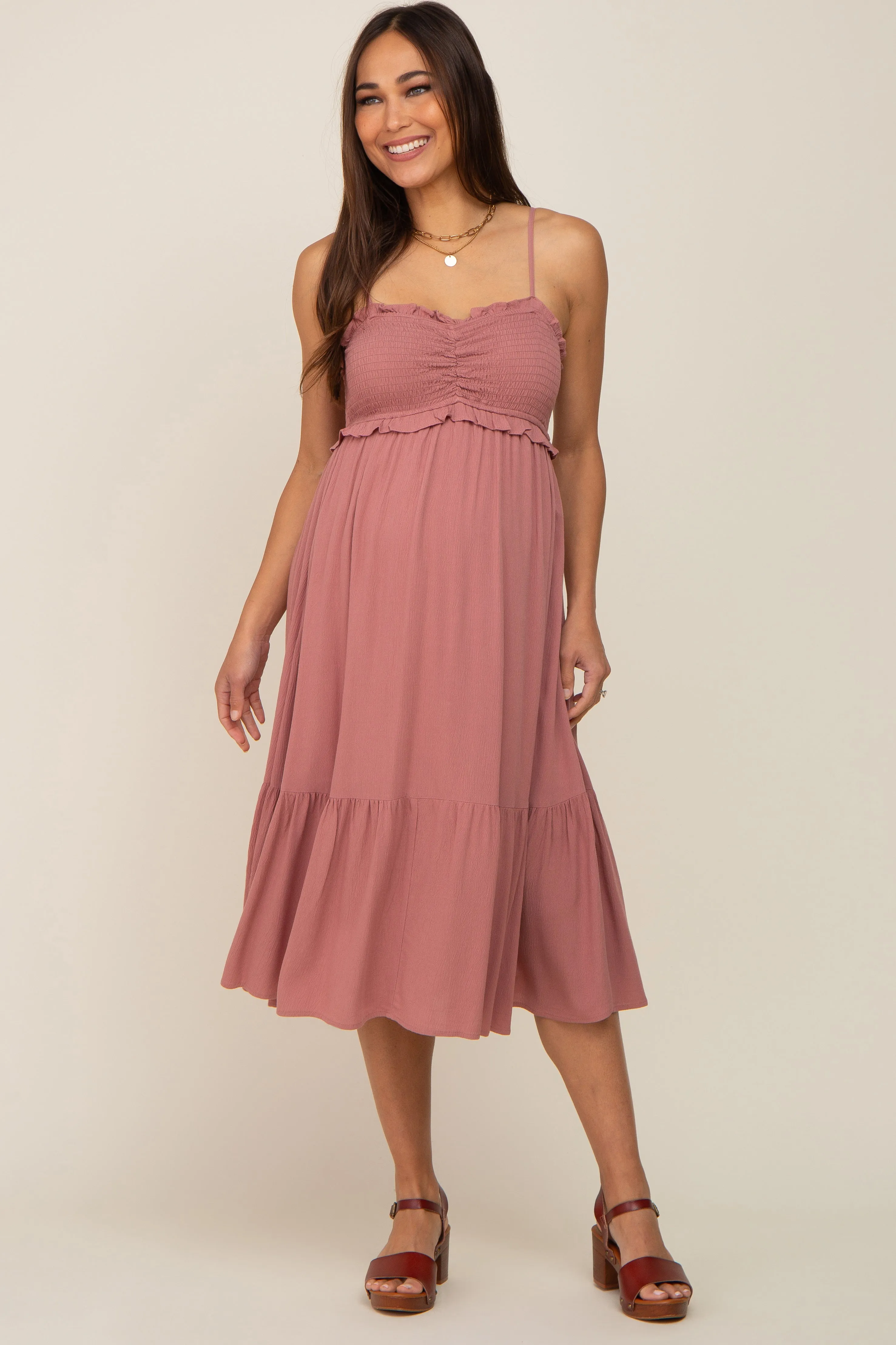 Mauve Smocked Ruffle Accent Maternity Midi Dress sold by Pinkblush