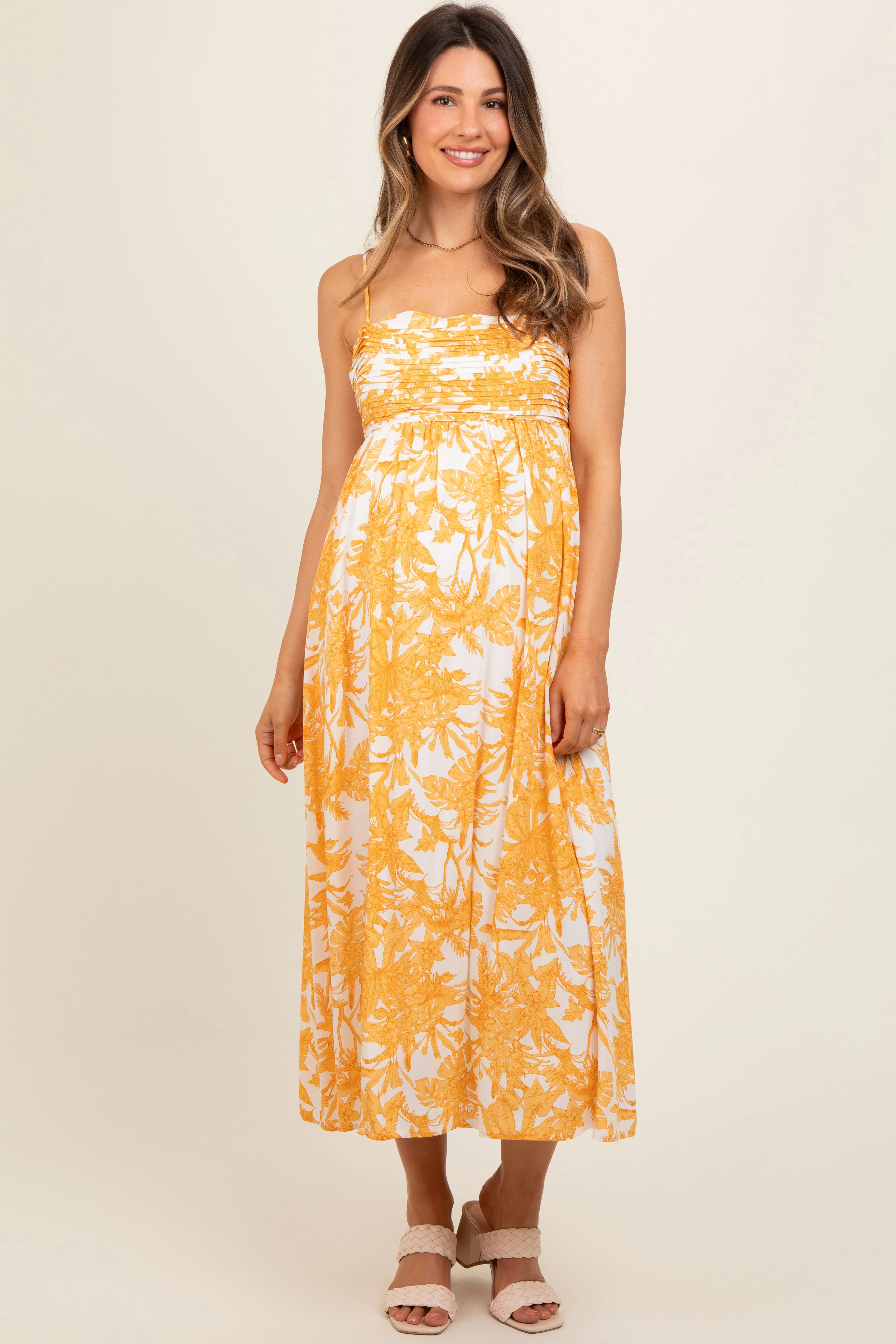 Yellow Floral Pleated Front Back Cut-Out Maternity Midi Dress sold by Pinkblush