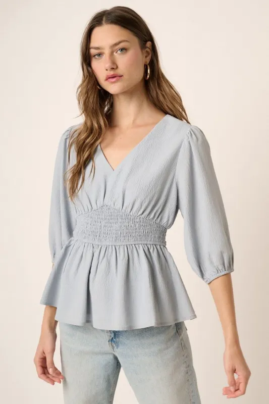Dusty Blue Smocking Detail Peplum Blouse sold by Pinkblush