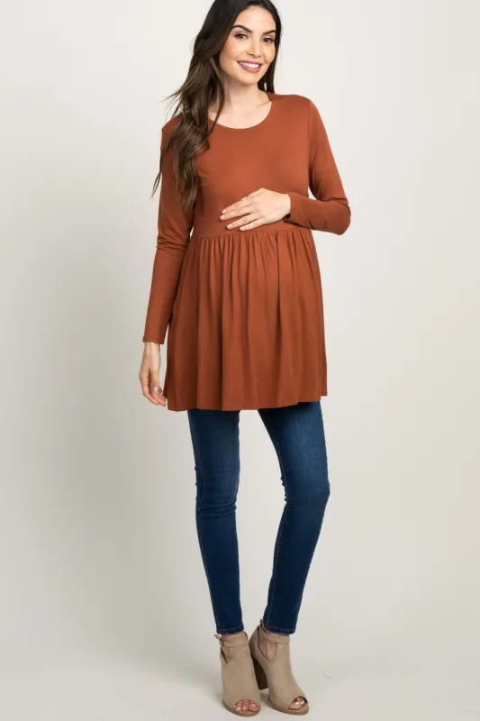 Rust Solid Long Sleeve Peplum Maternity Top sold by Pinkblush