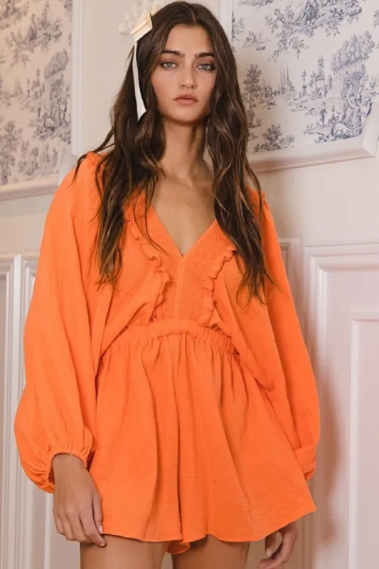 Coral Smocked V-Neck Ruffled Solid Woven Romper sold by Pinkblush