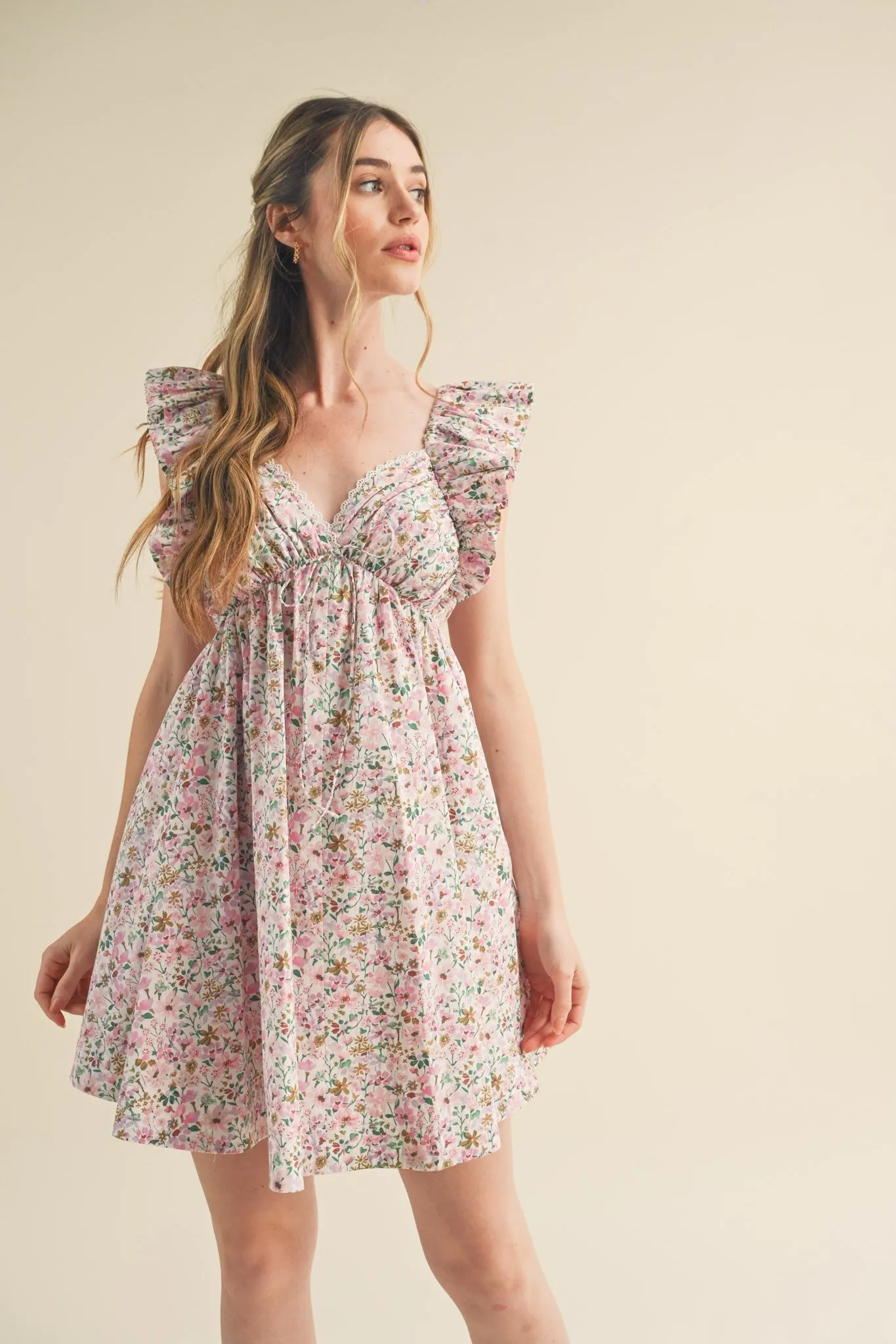 Pink Multi Floral Flutter Sleeve Mini Dress sold by Pinkblush