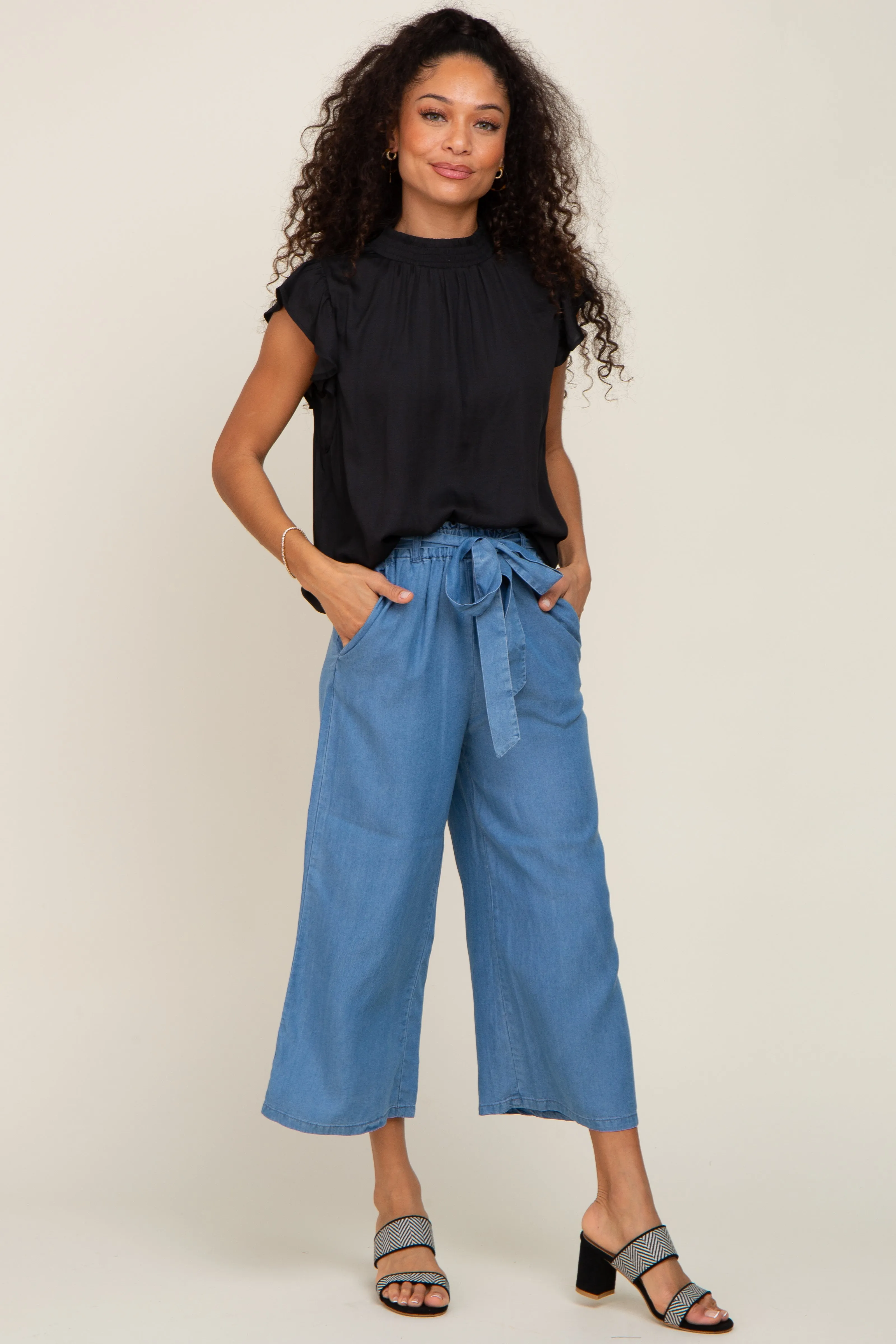 Black Mock Neck Flutter Blouse sold by Pinkblush