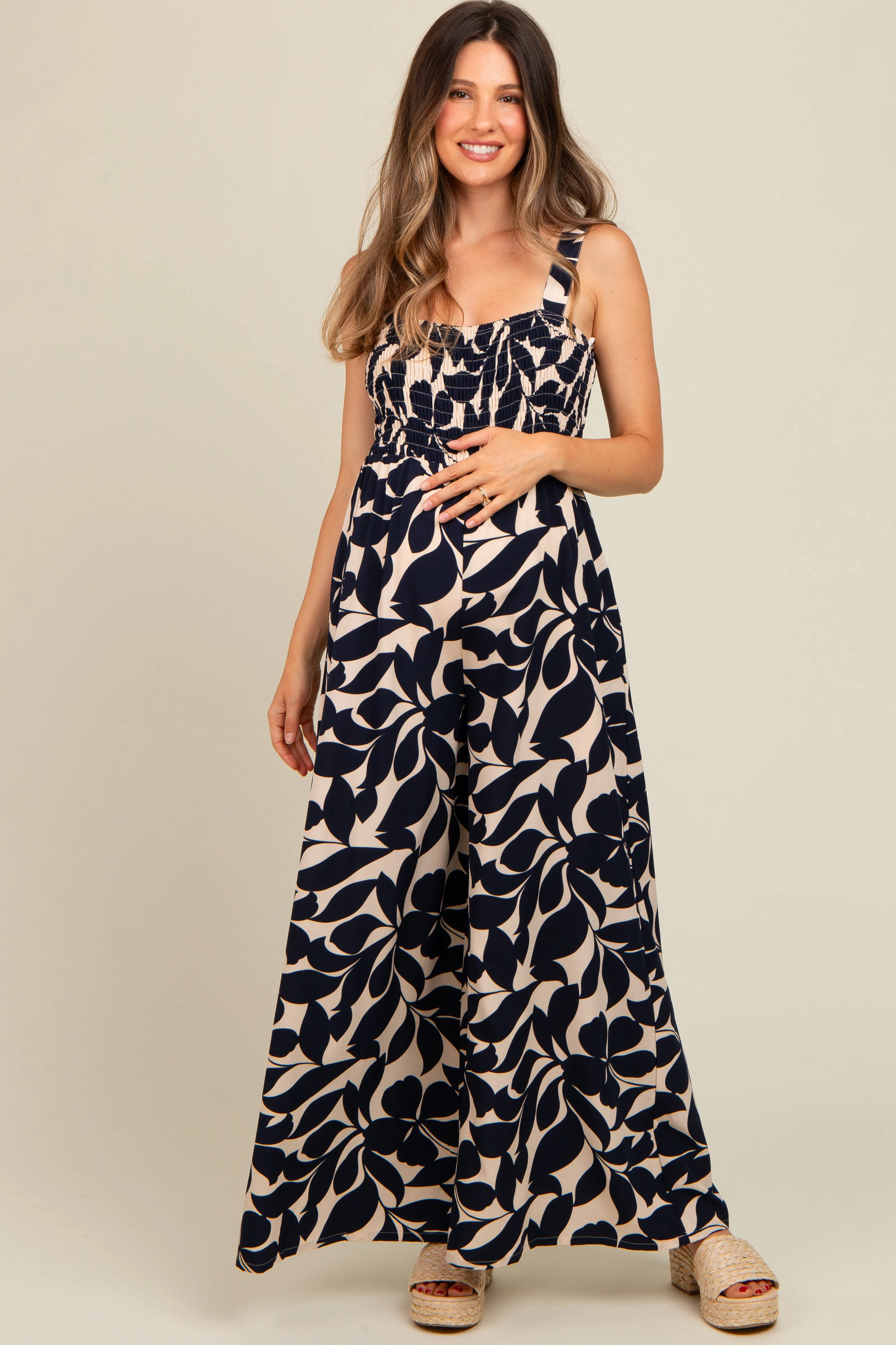 Navy Floral Smocked Wide Leg Maternity Jumpsuit sold by Pinkblush product image thumbnail 2